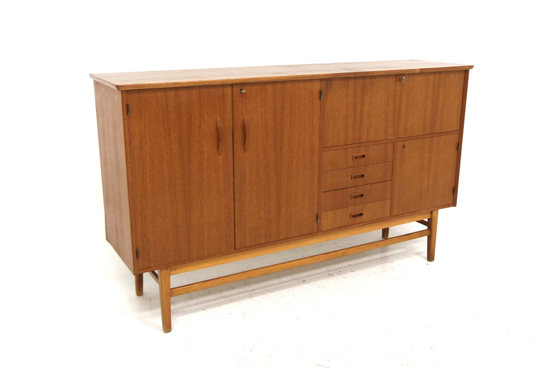 Sideboard / Highboard Year: 1950s Origin: Swe. Material: Teak Beech