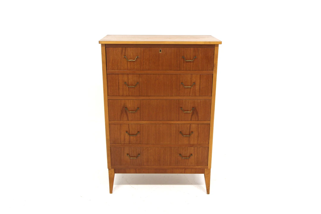 Chest of drawers / Tallboy Year: 1950s Origin: Swe. Material: Teak