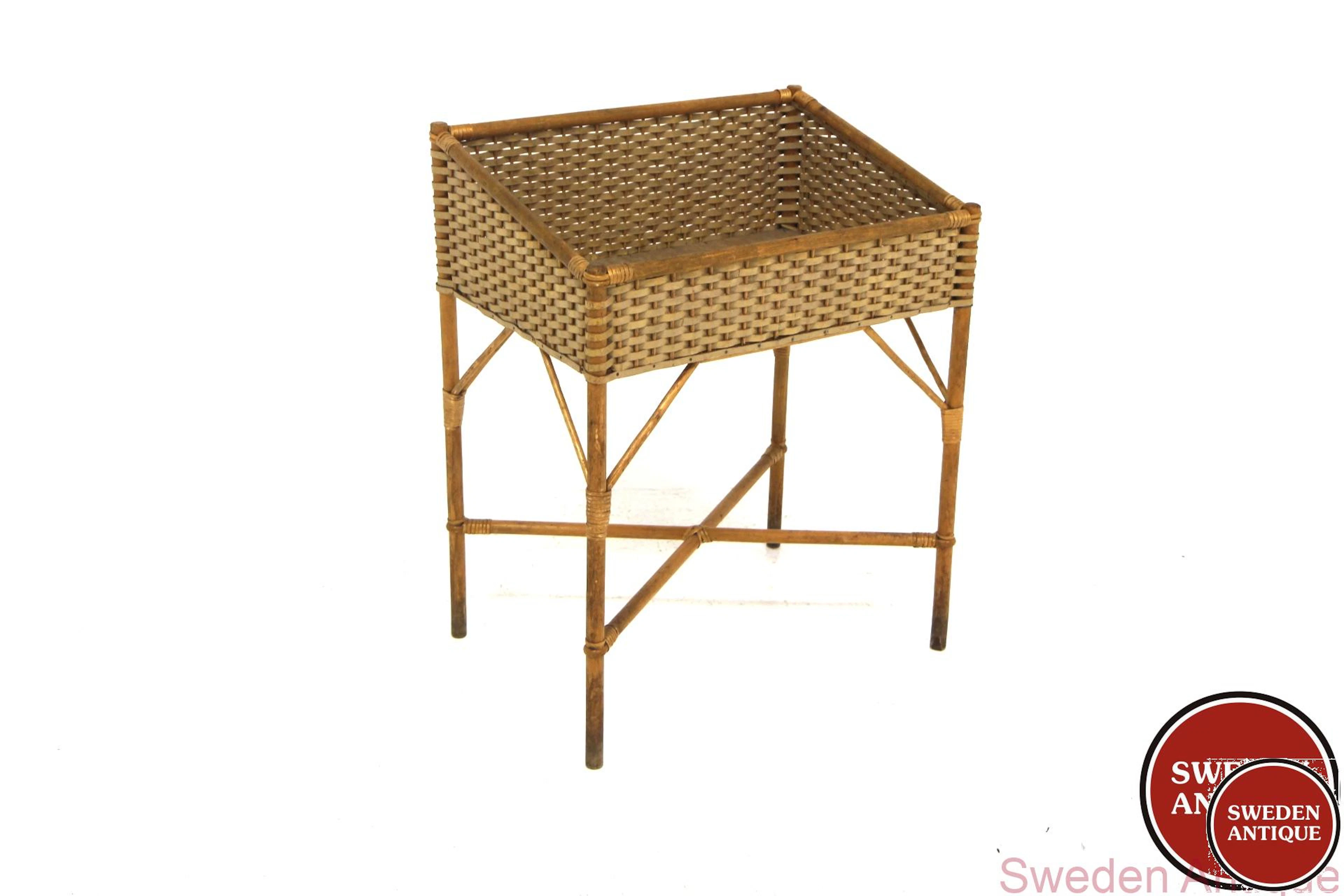 Flower stand Year: 1950s Origin: Swe. Material: Pine Rattan W: 64cm