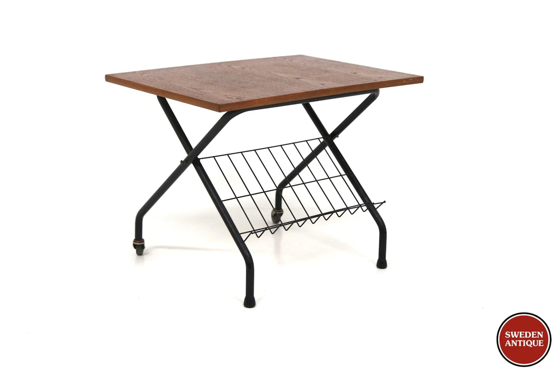 Side table Year: 1950s Origin: Swe. Material: Teak Metal W: 63cm D: