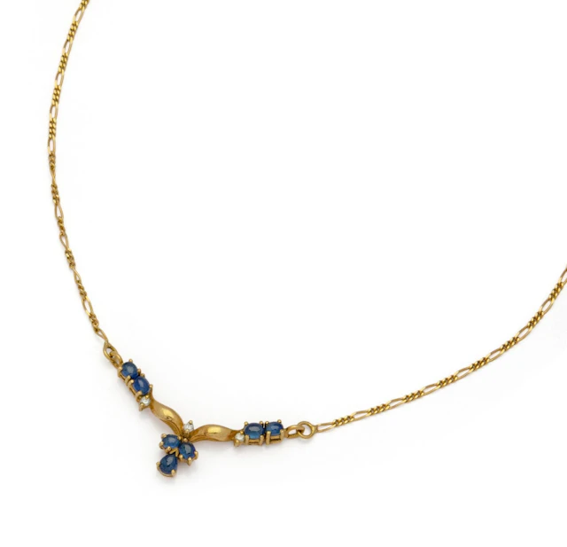 COLLIER en or jaune 18K (750/1000) articulé d’un motif en V - Lot 195