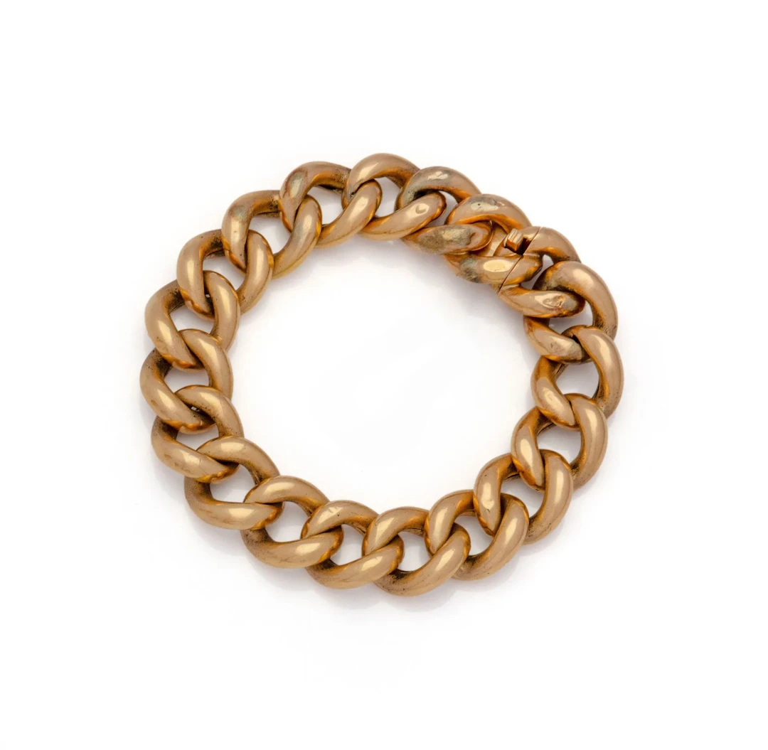 BRACELET GOURMETTE en or rose 18K (750/1000). Fermoir à cliq - Lot 89