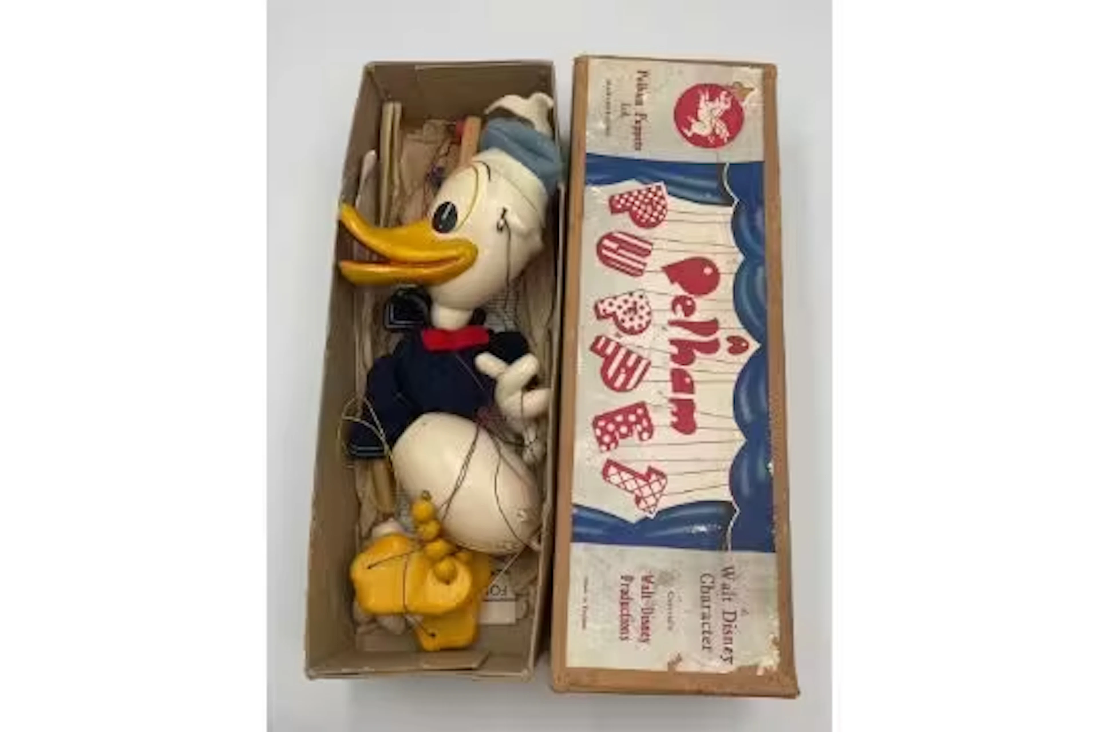 A vintage boxed type SL Walt Disney Character Donald Duck Pelham Puppet