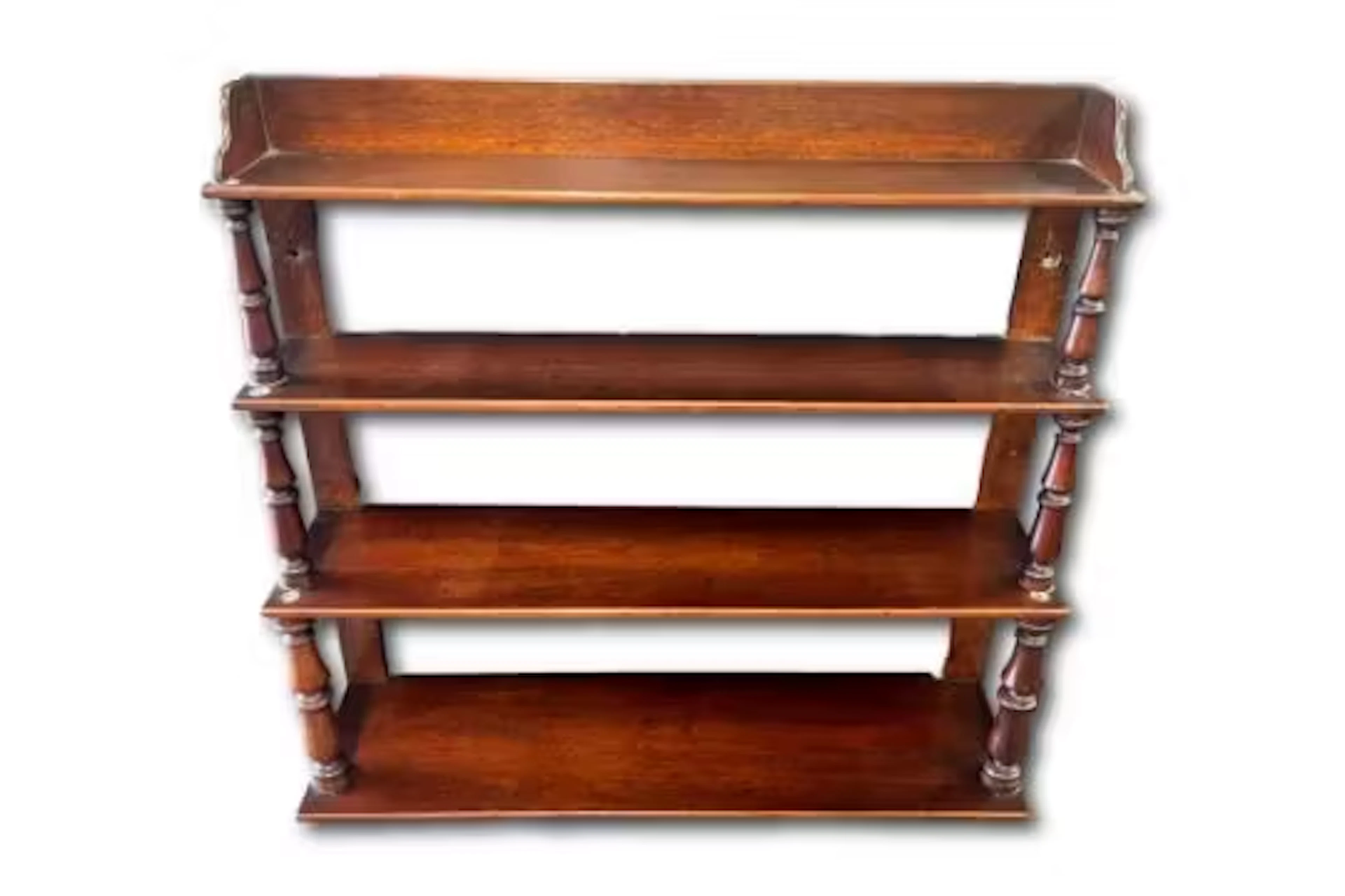 A 19th century mahogany wall shelf, comprising four shelves with turned