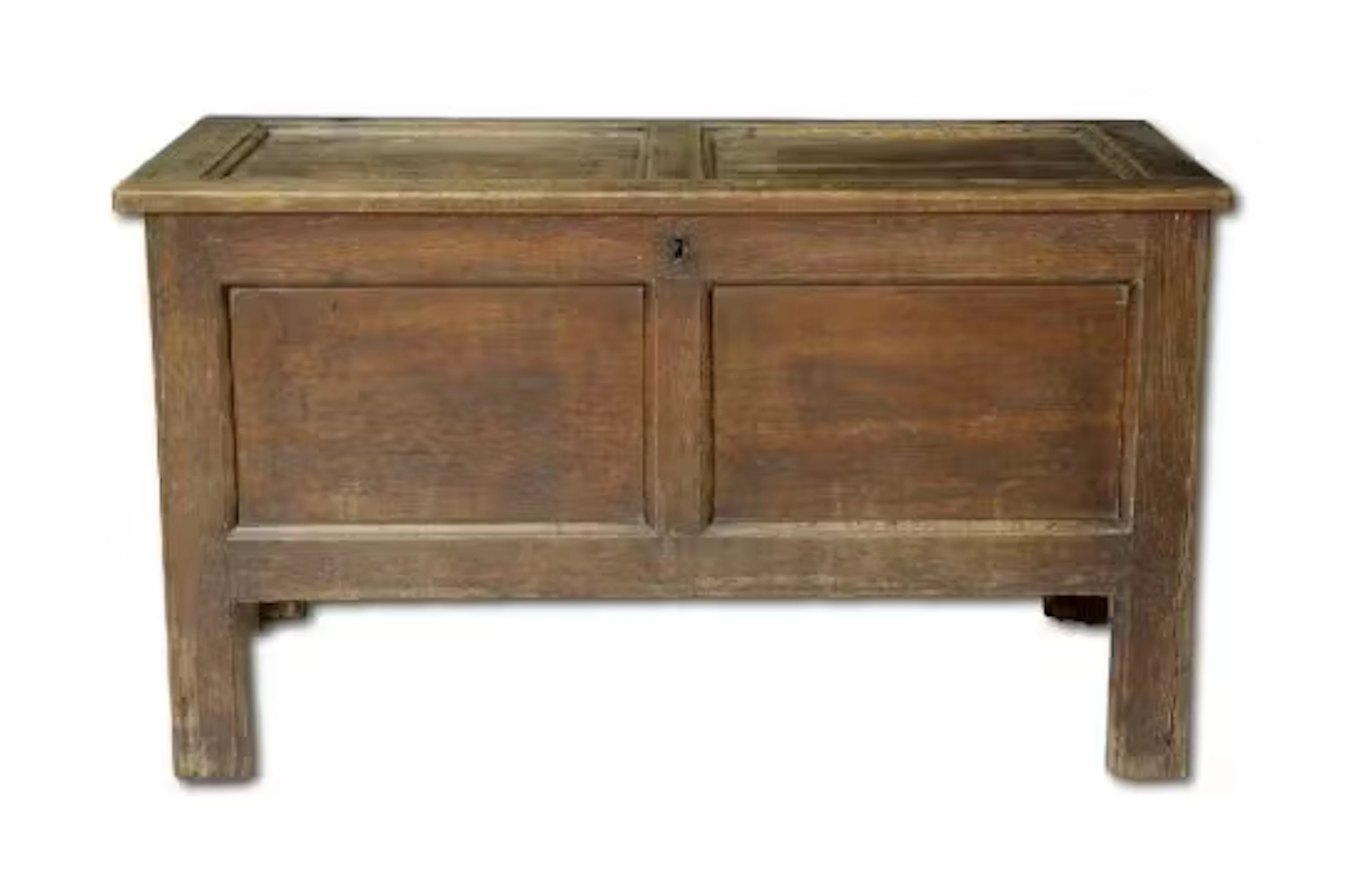 A 17th century and later two panel oak coffer, of typical form, 112cm. wide.