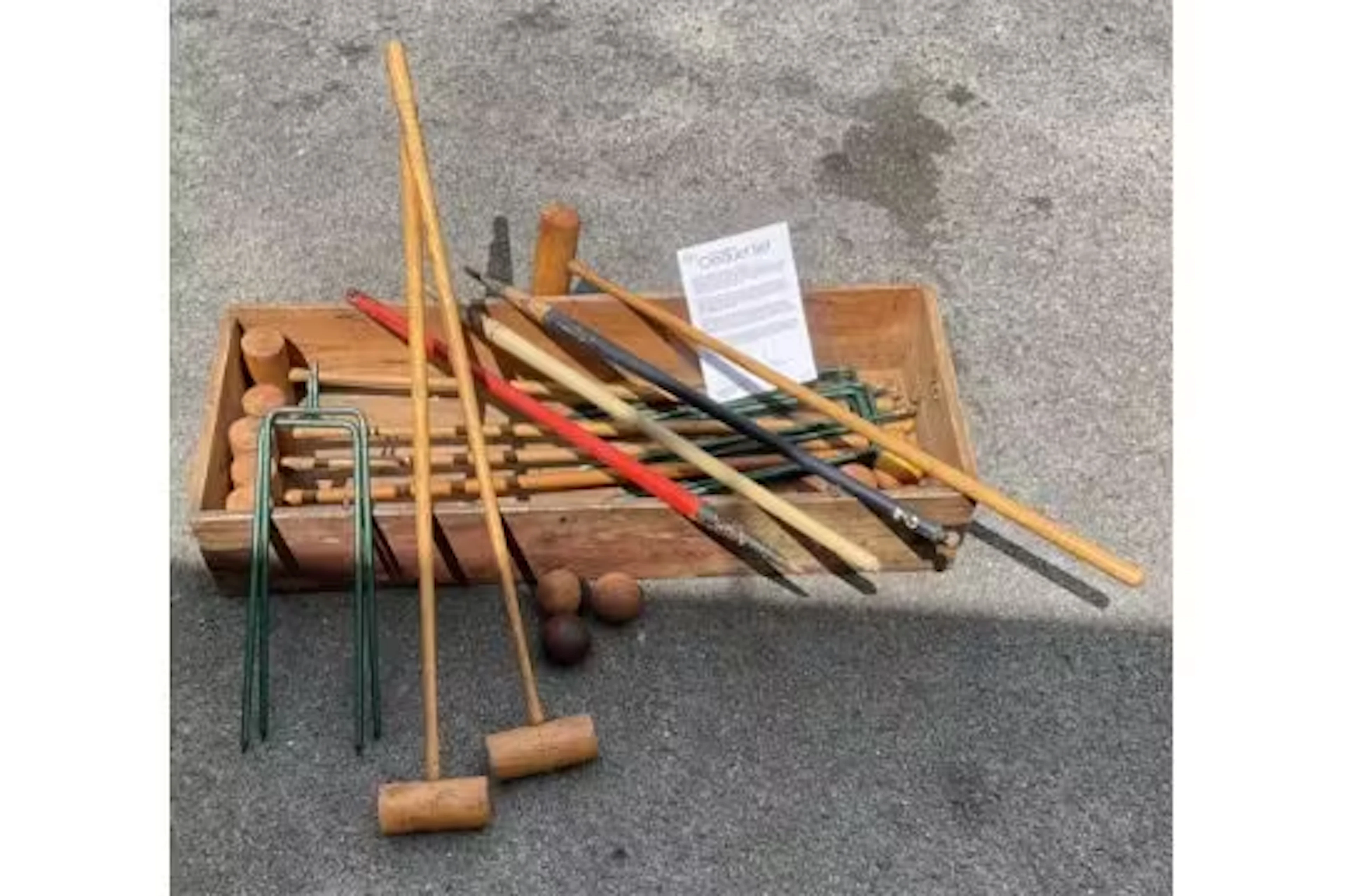 An F. H. Ayres cased croquet set.