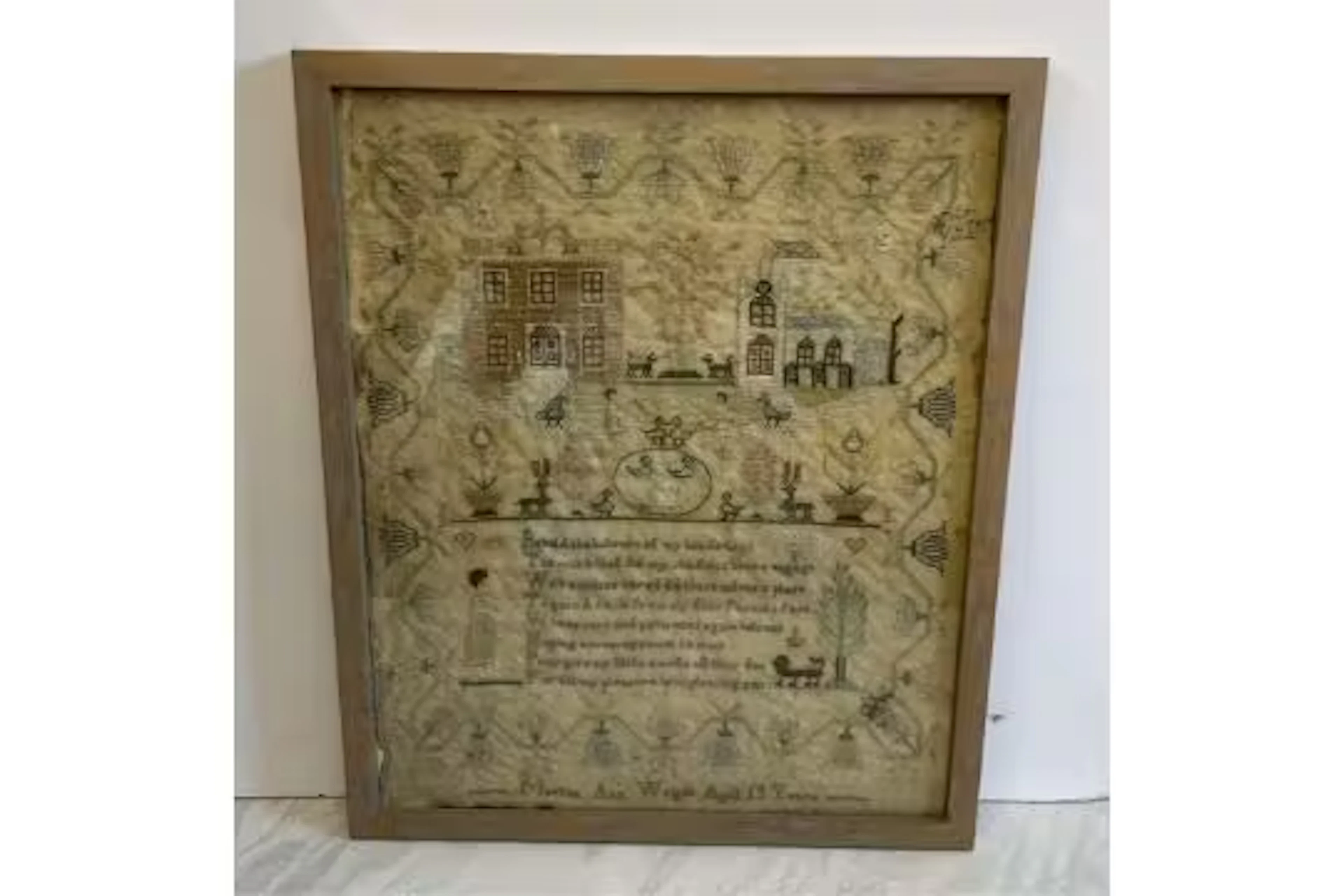 A late 18th century needlework sampler, worked by Martha Ann Wright