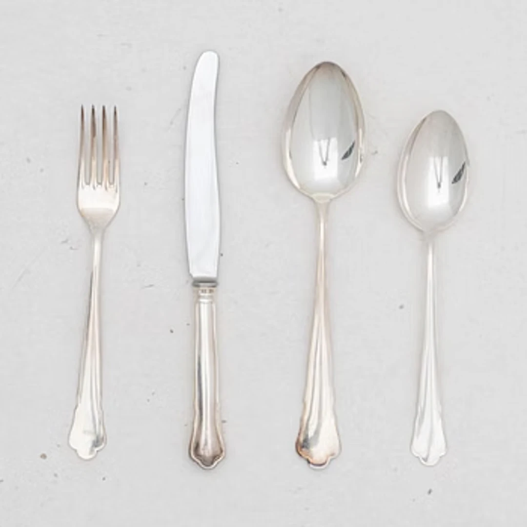 Guldsmedsaktiebolaget (GAB), A 24 piece 'Chippendale' silver cultery