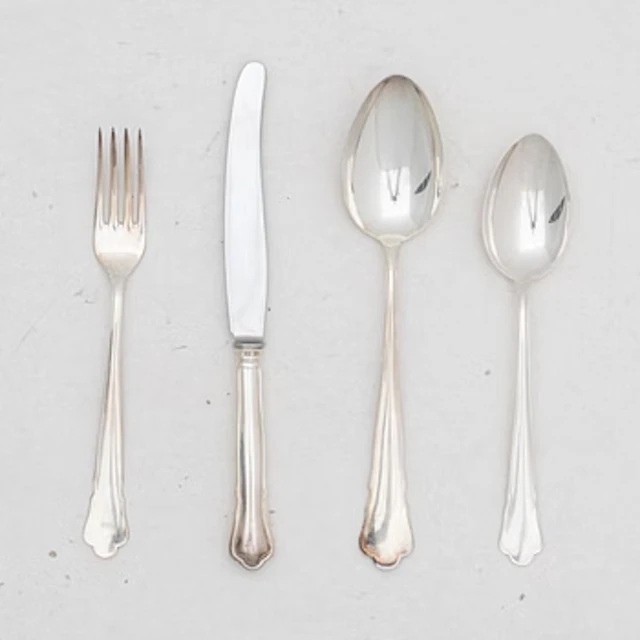 Guldsmedsaktiebolaget (GAB), A 24 piece 'Chippendale' silver cultery