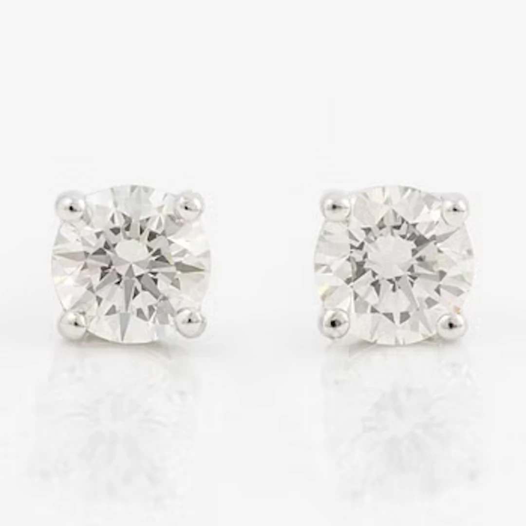 Earrings 18K white gold with brilliant-cut diamonds, accompanying GIA dossier.