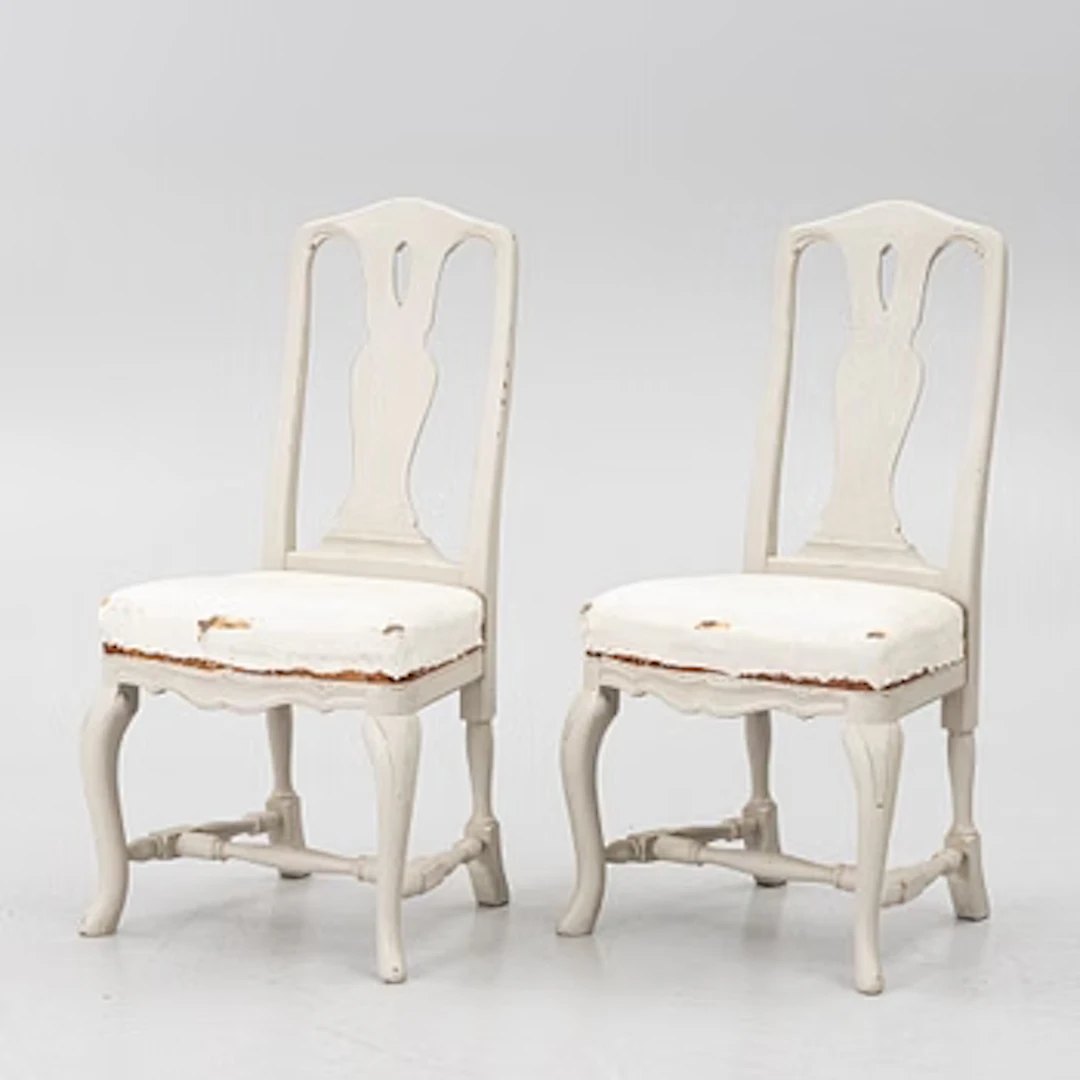 A pair of Rococo-style chairs, 20th century.