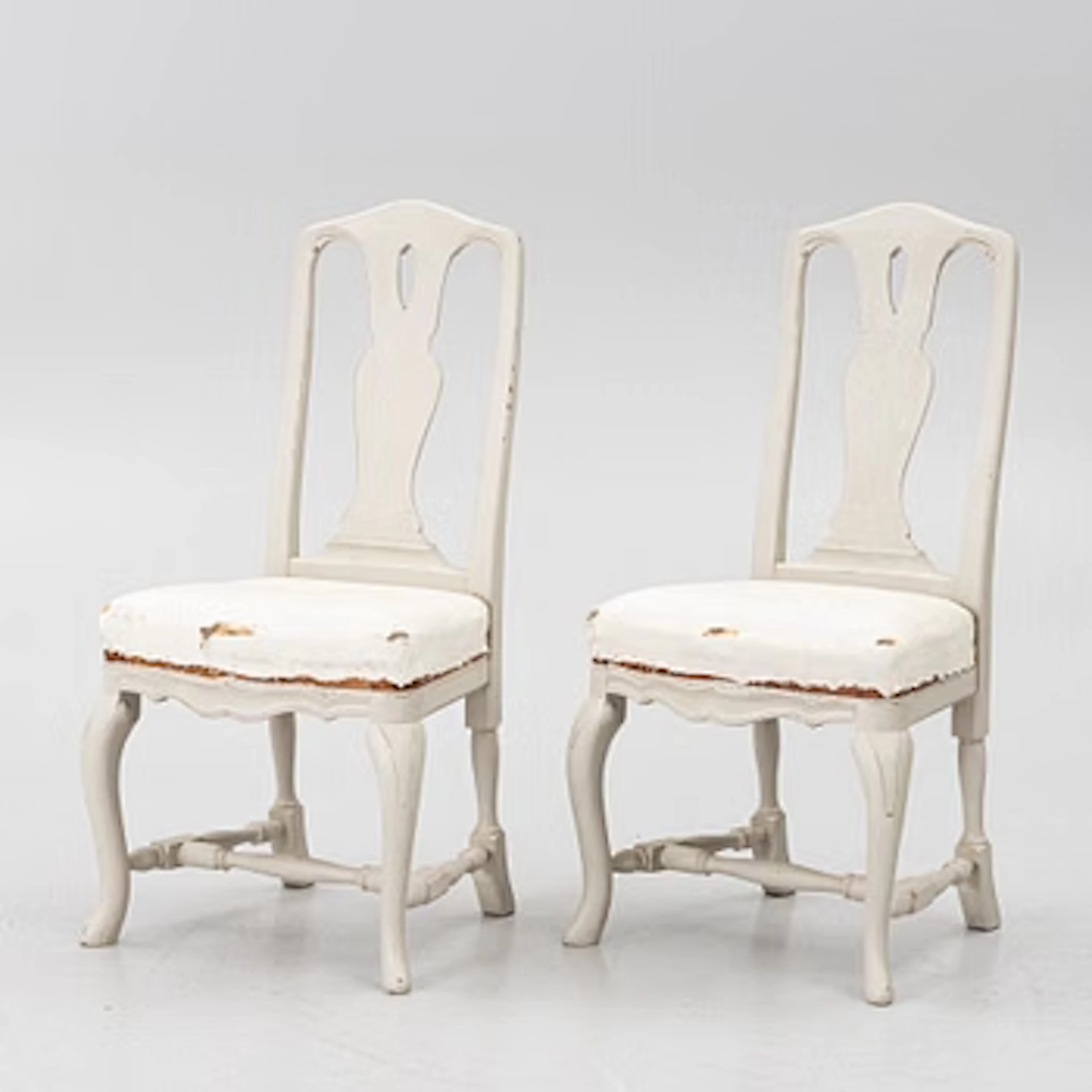 A pair of Rococo-style chairs, 20th century.