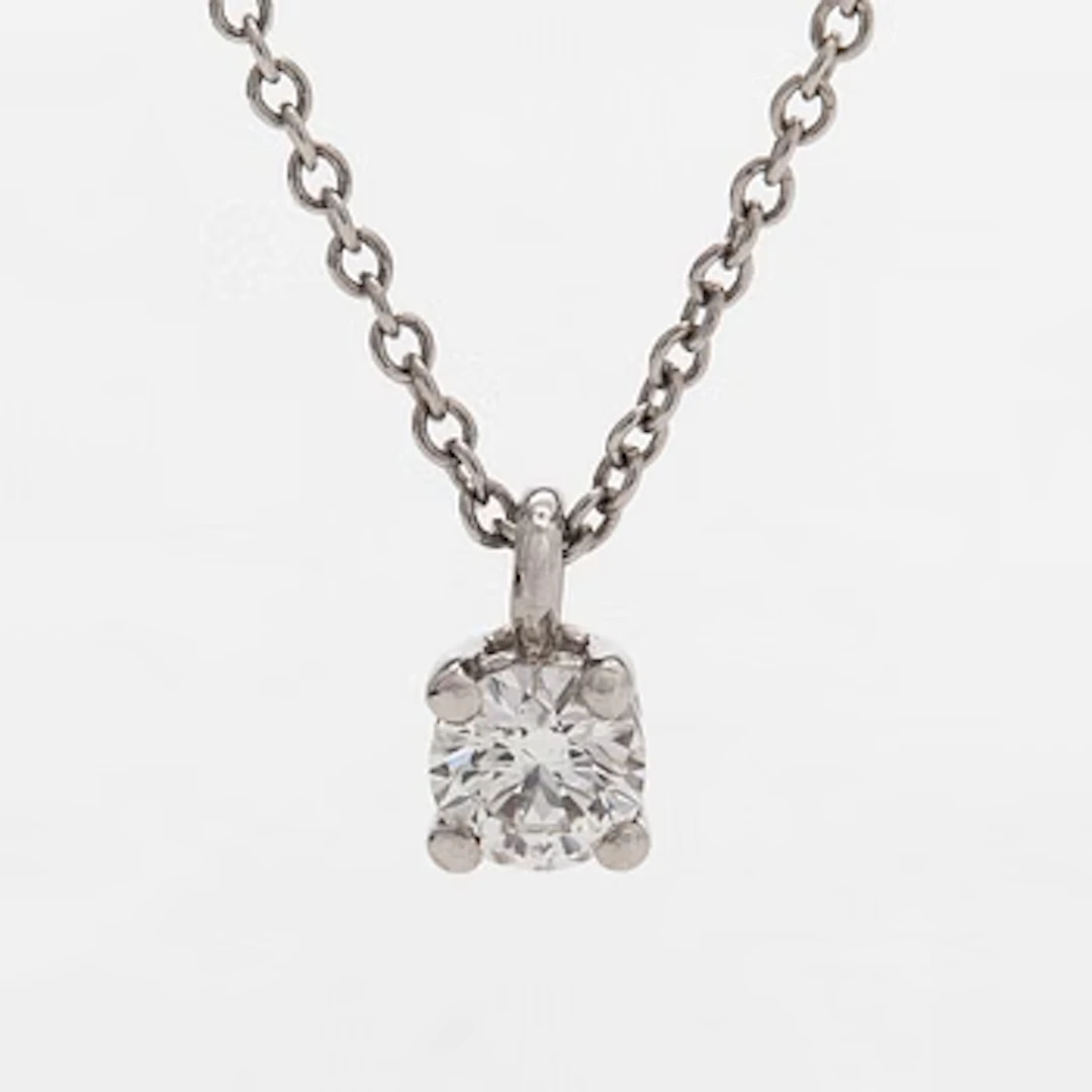 Tiffany & Co, a platinum necklace with a brilliant-cut diamond.