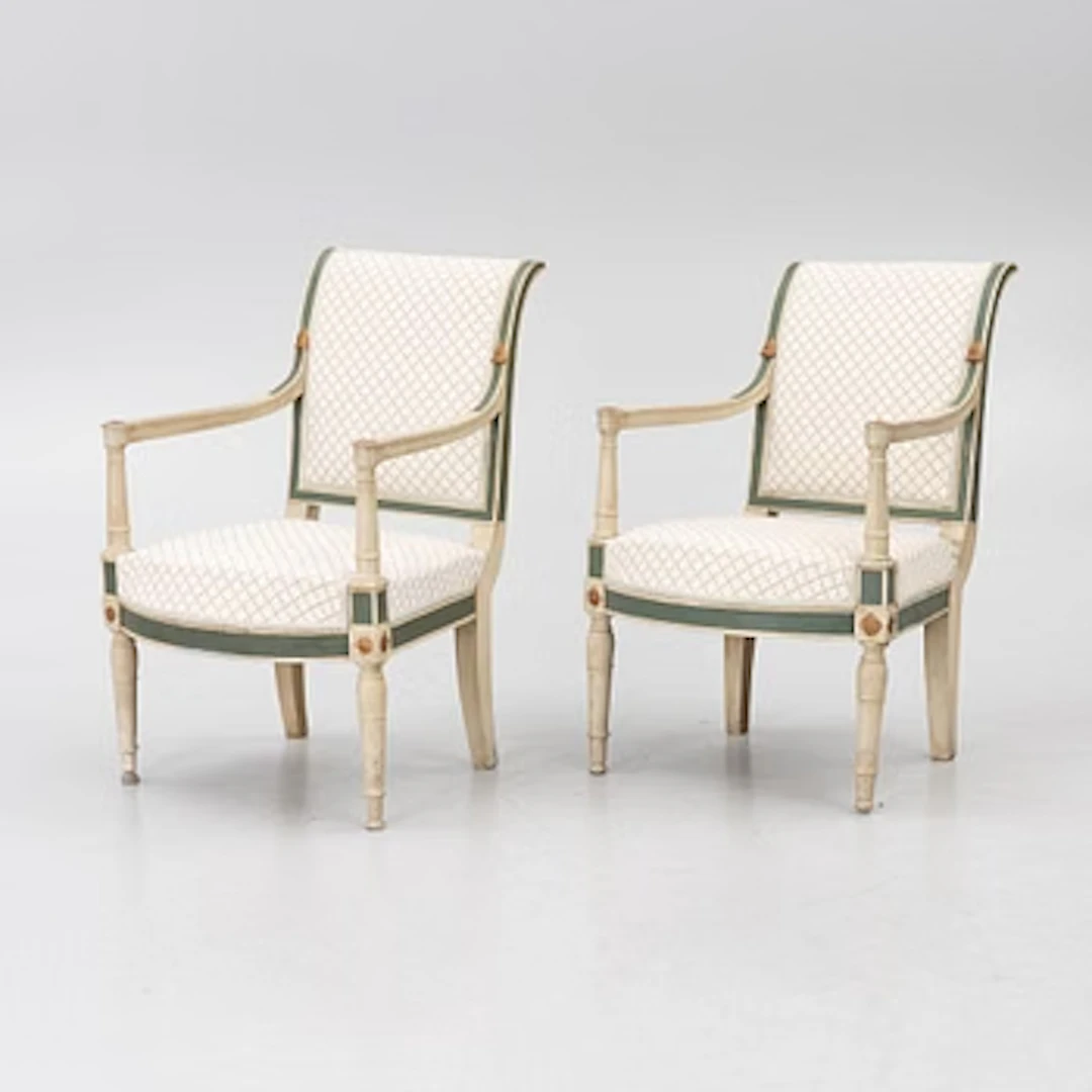 A pair of armchairs, Directoire, France, late 18th Century.