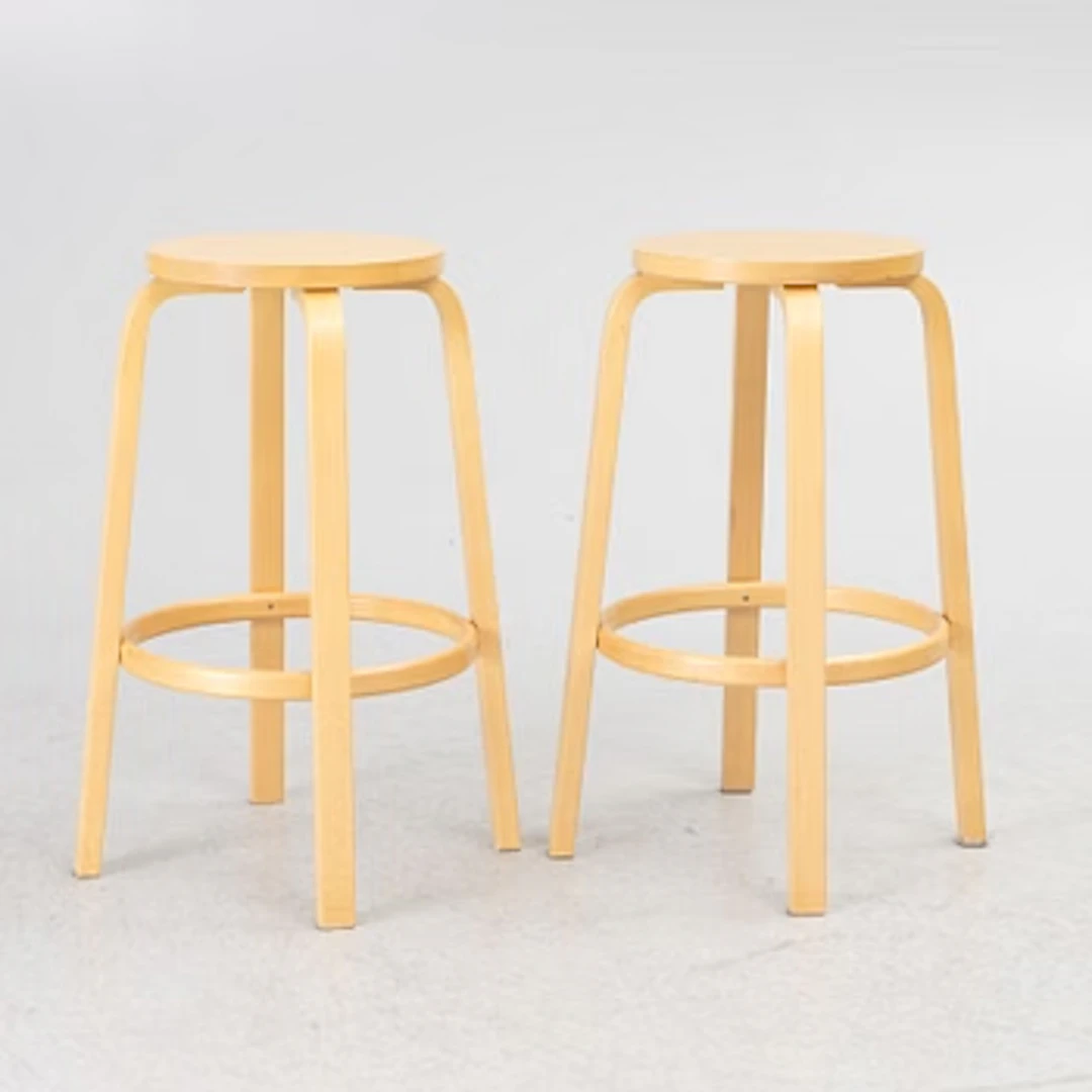 Alvar Aalto, a pair of bar stools, Artek, Finland, 2002.