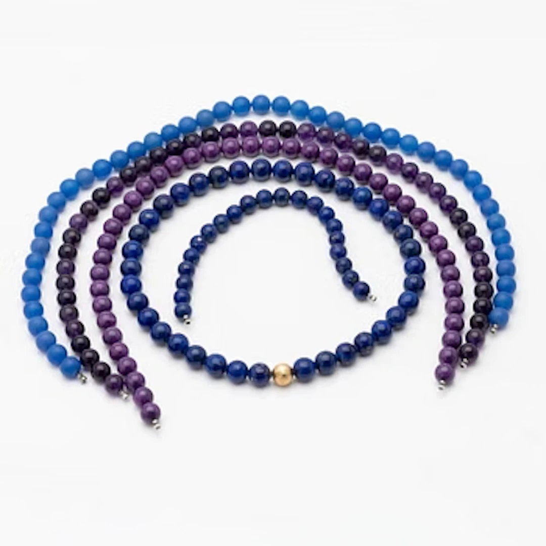 Ole Lynggaard, Ball clasp in 18K gold, with four stencolliers with