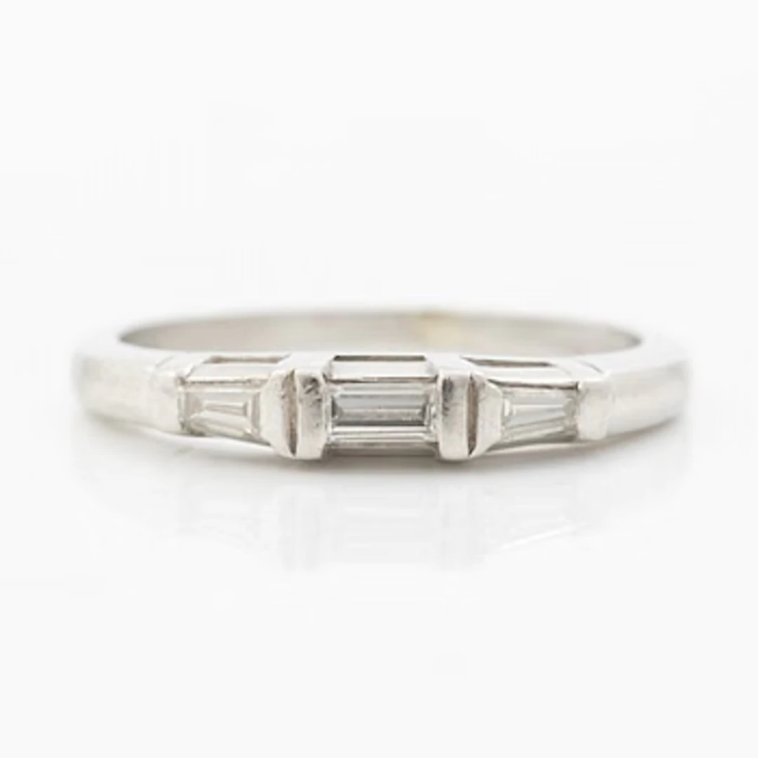 Platinum ring with baguette-cut diamonds.