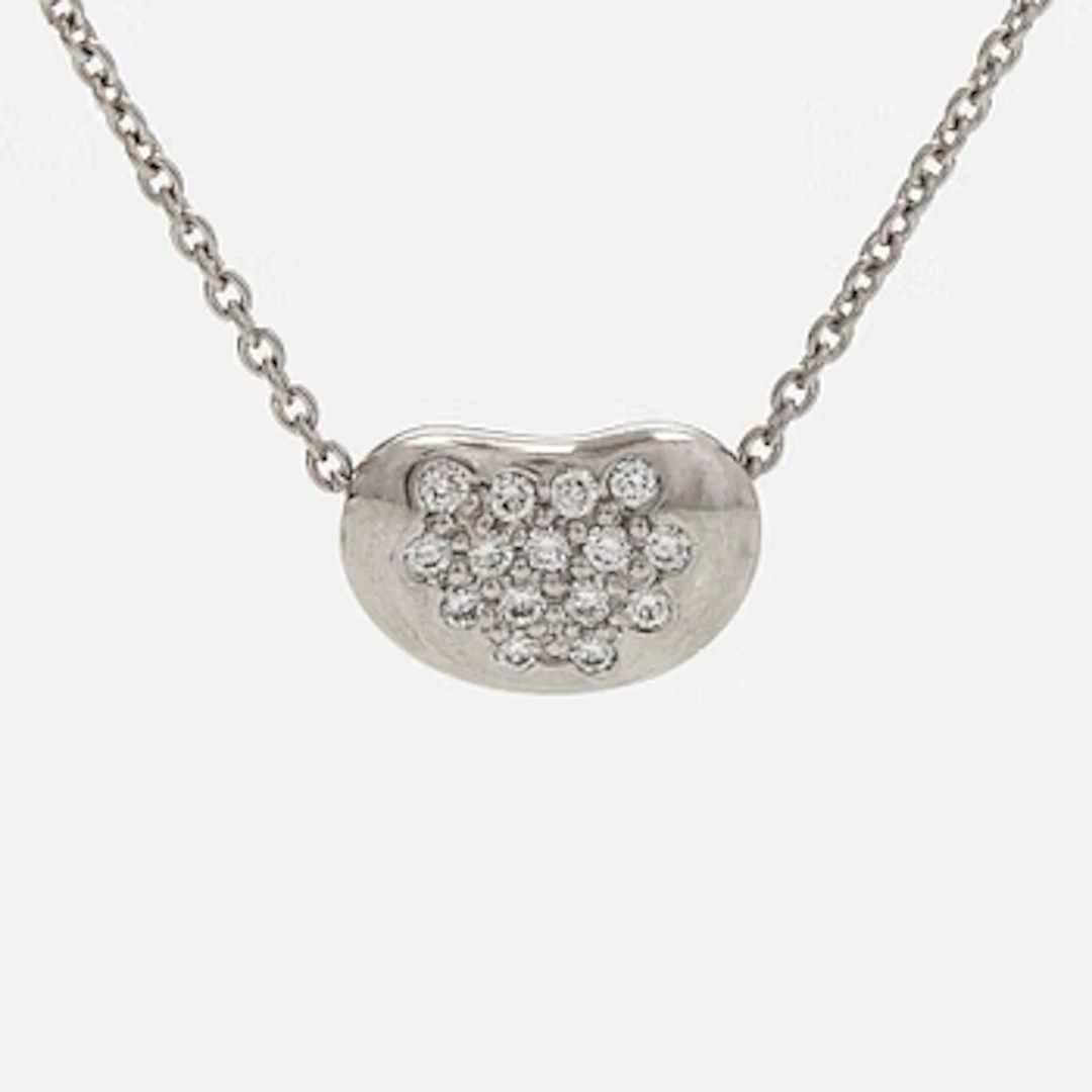 Tiffany & Co, Elsa Peretti, a platinum and diamond "Bean" necklace.