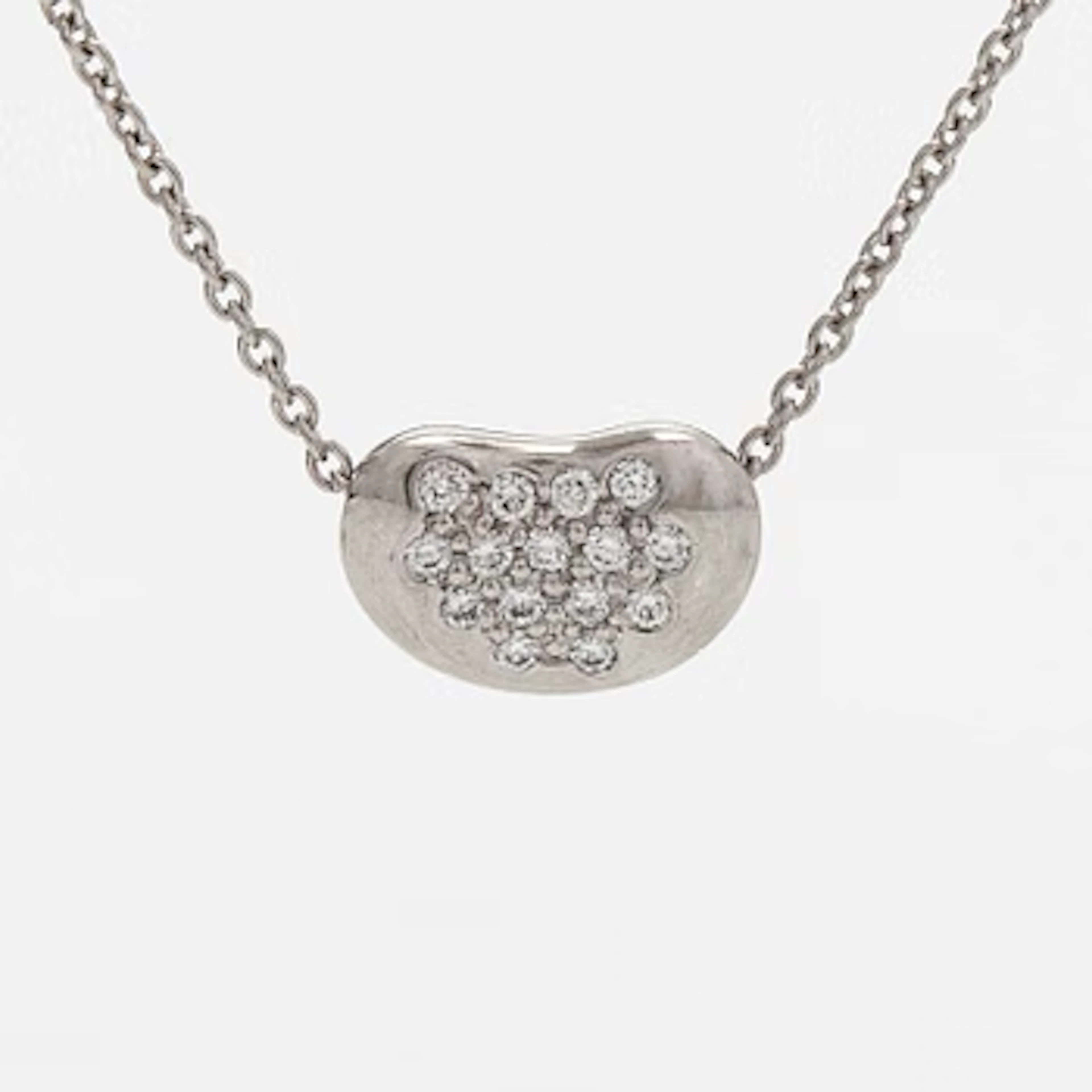 Tiffany & Co, Elsa Peretti, a platinum and diamond "Bean" necklace.