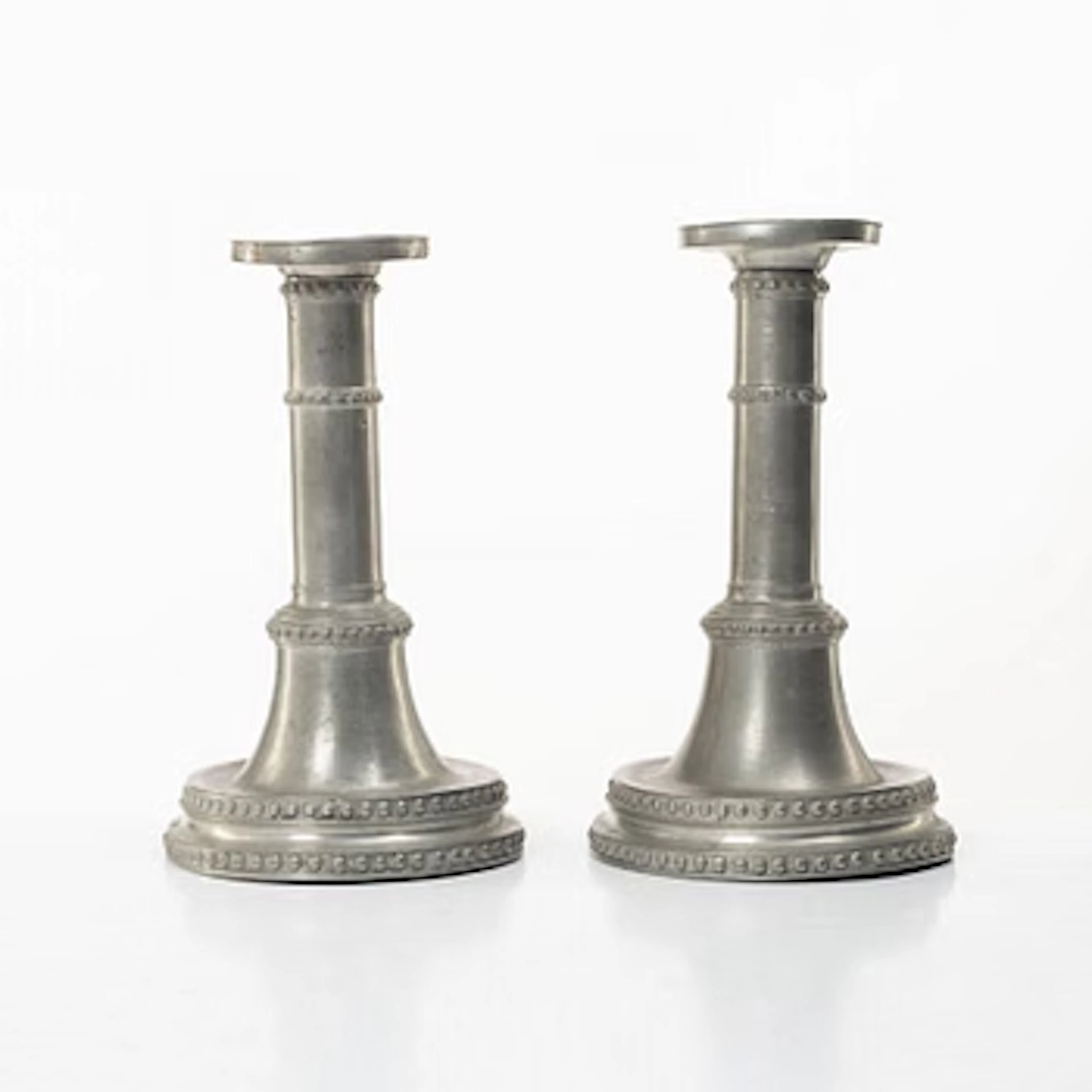 A pair of 19th century candle holders in peuter.