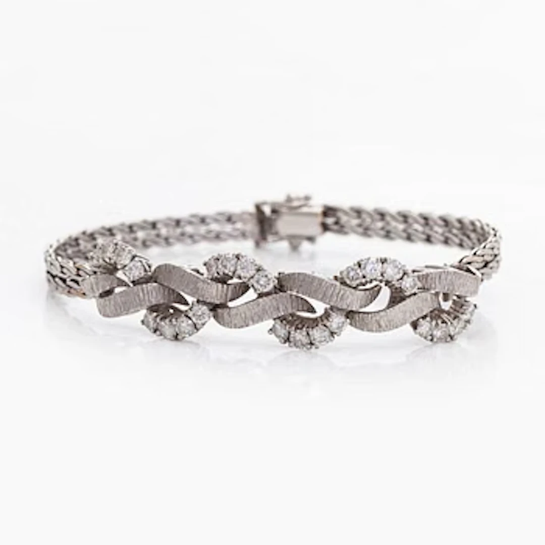 Bracelet, brilliant cut diamonds, 18K white gold.