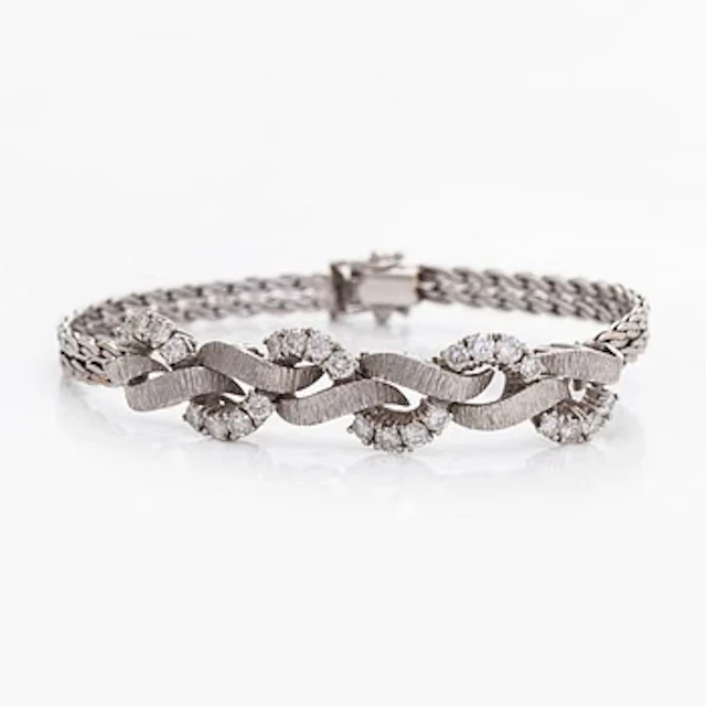 Bracelet, brilliant cut diamonds, 18K white gold.