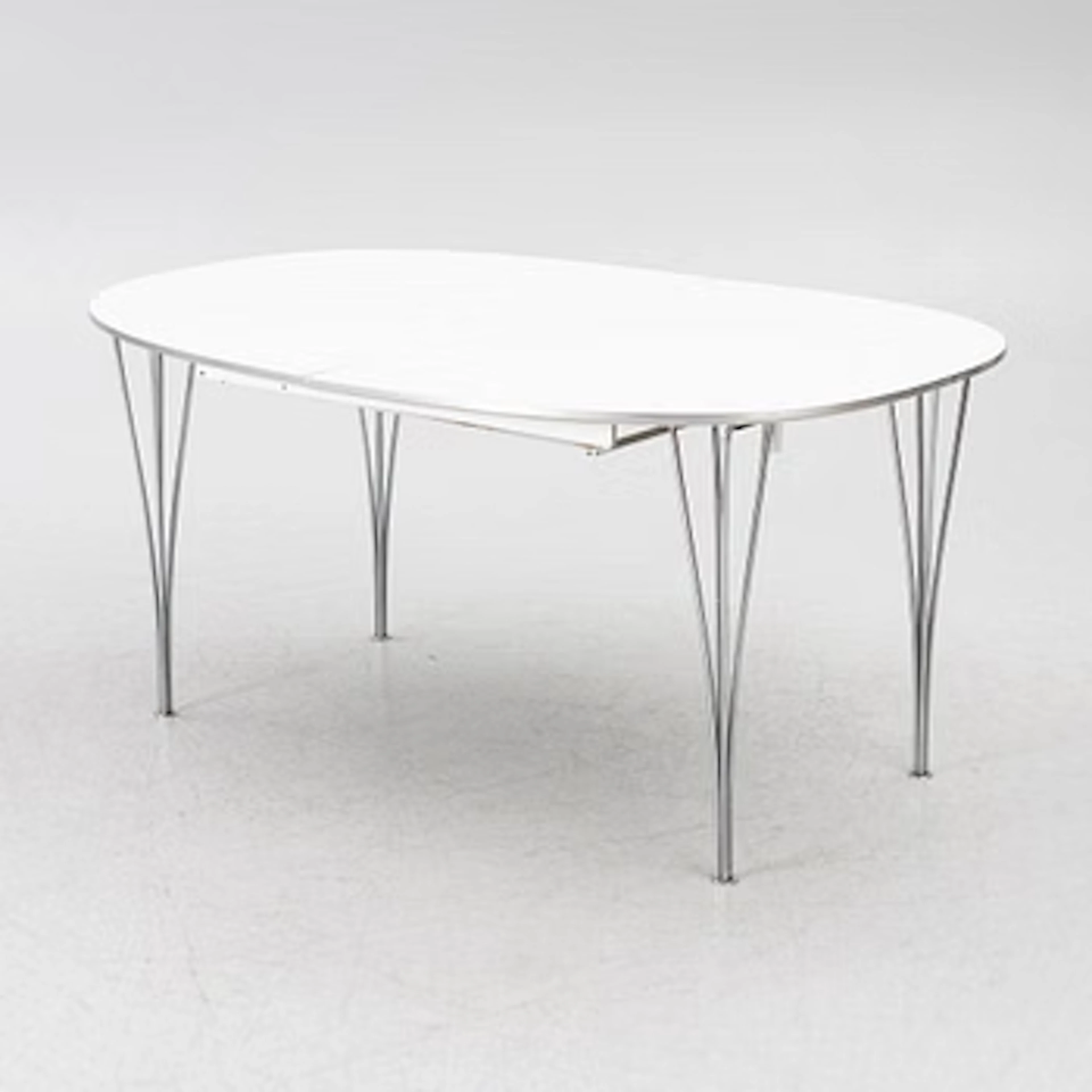 Bruno Mathsson, & Piet Hein, dining table, “Superellipse”, Fritz Hansen, 1987.