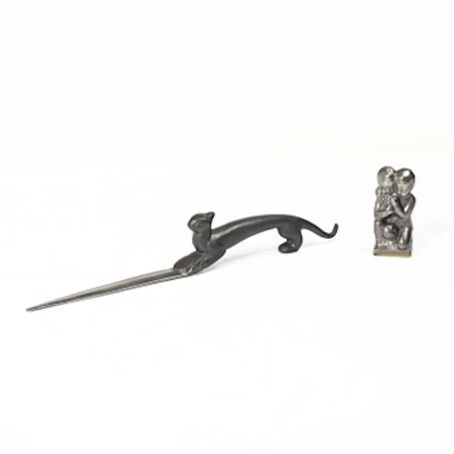 Firma Svenskt Tenn, A pewter paper knife and seal stamp.