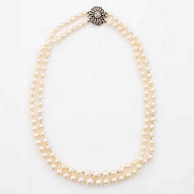 Two-row cultured pearl necklace with a silver and 18K gold clasp set