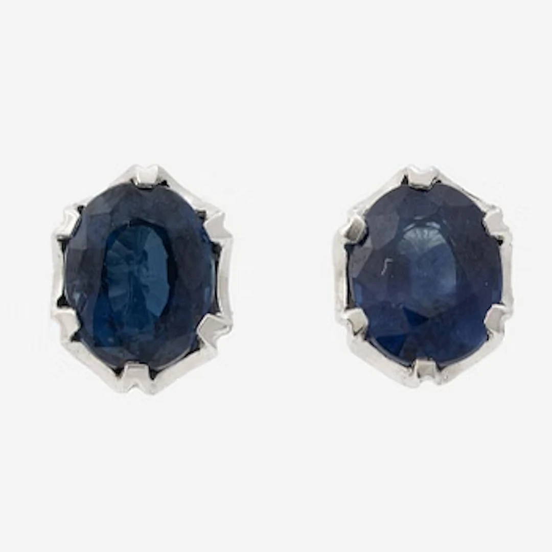 14K white gold earrings with faceted sapphires.