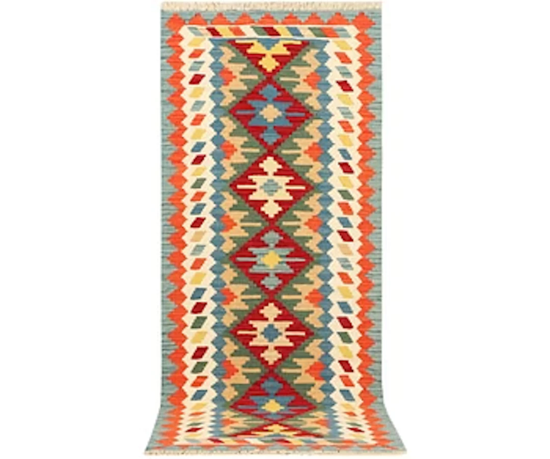 An Afghan kilim runner, c. 200 x 80 cm.