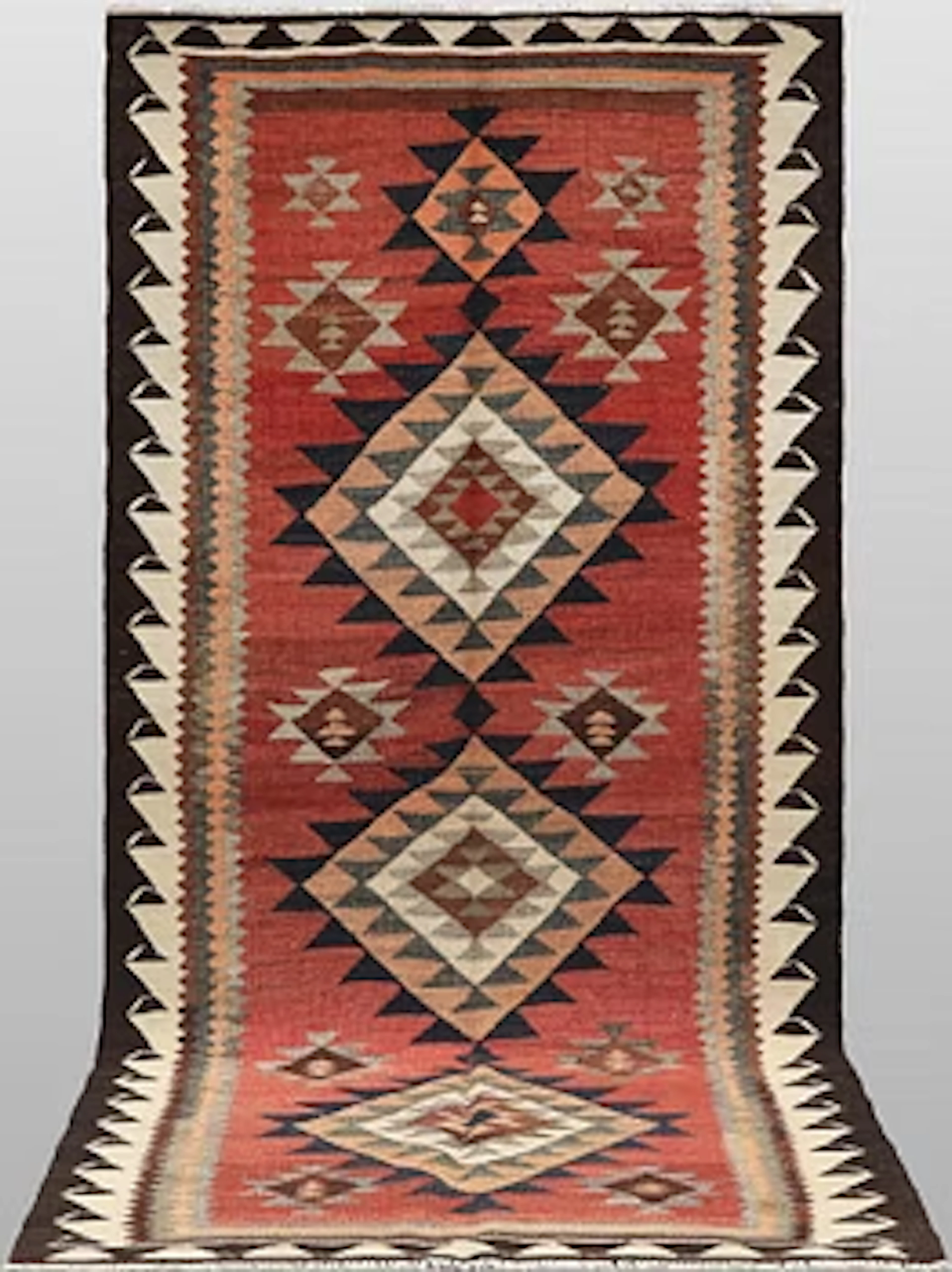 A Nomad Kurdish kilim rug, 270 x 132 cm.