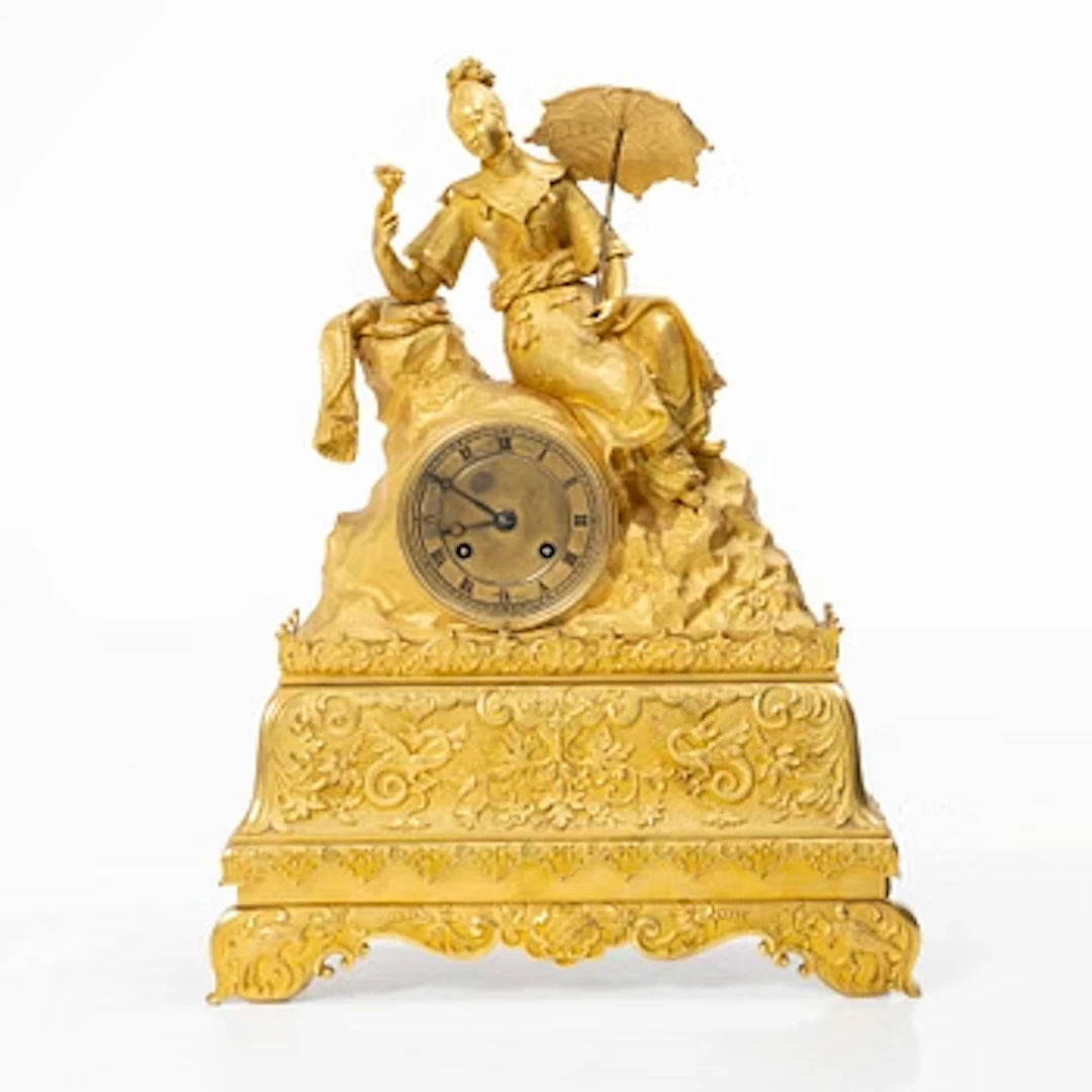 A Late Empire table clock, 19th century.