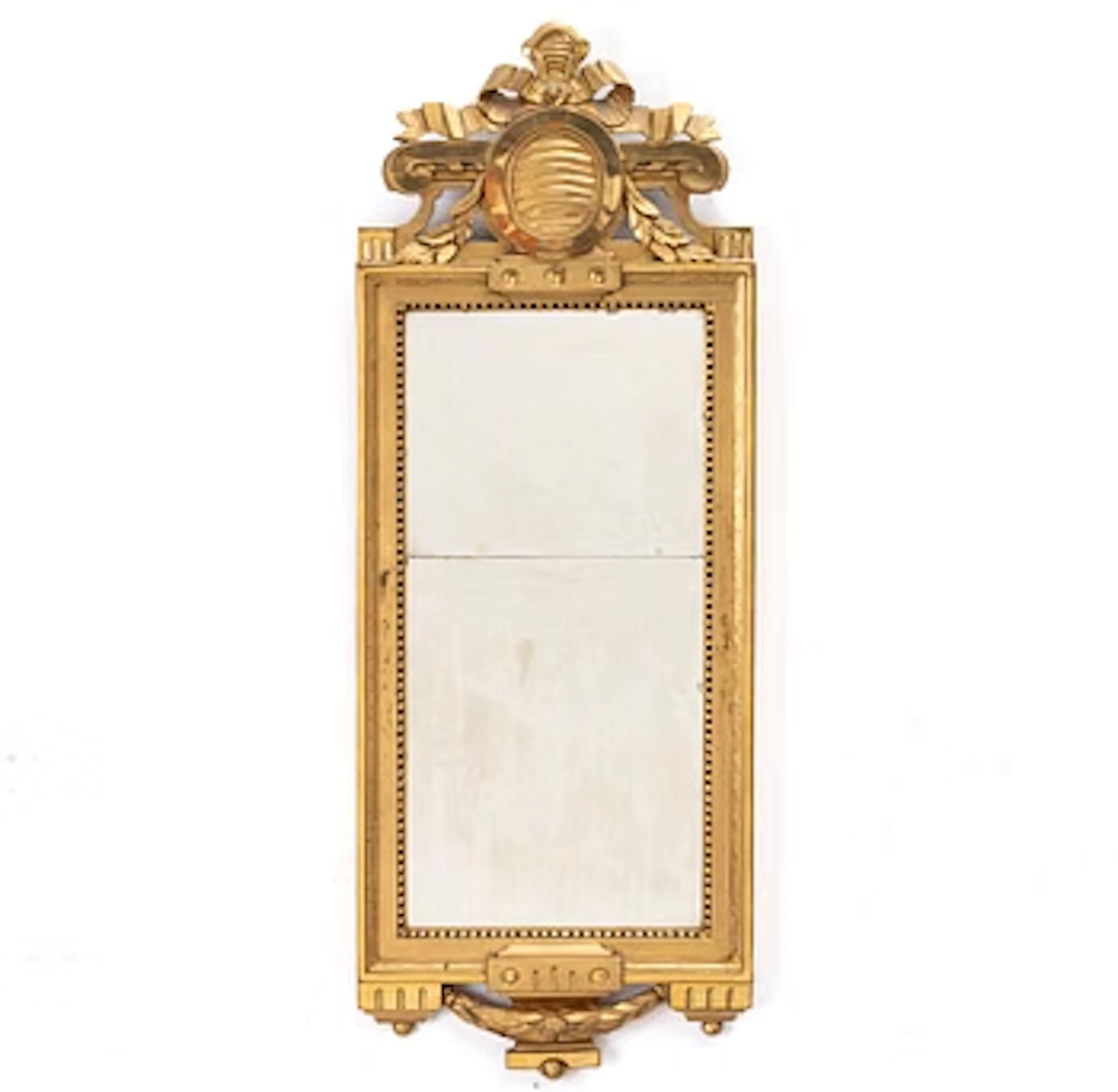 A Gustavian giltwood mirror, Stockholm, late 18th century.