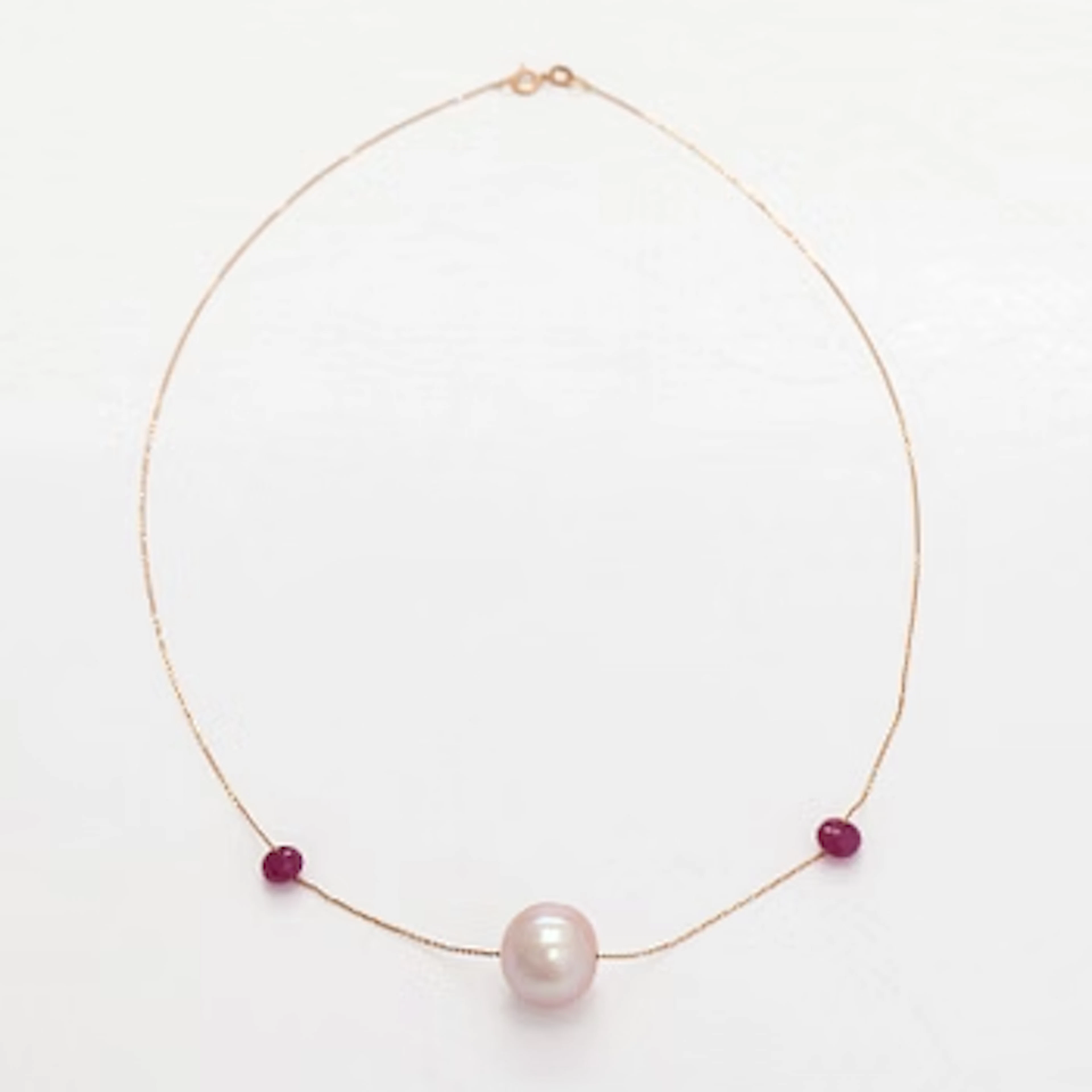 Necklace, cultured pearl, corundum, 14K gold.