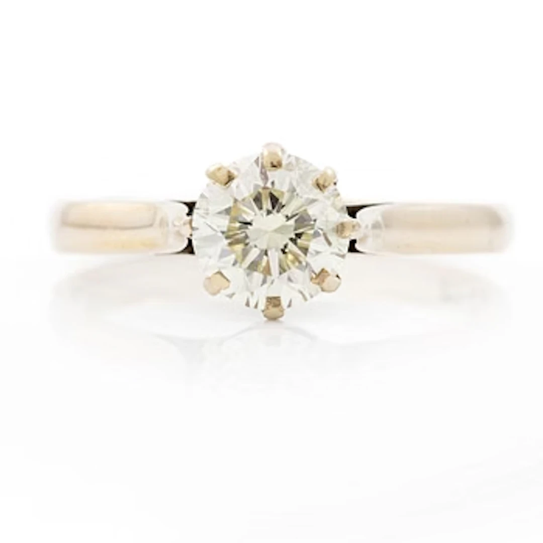 Ring, 18K white gold with brilliant-cut diamond.
