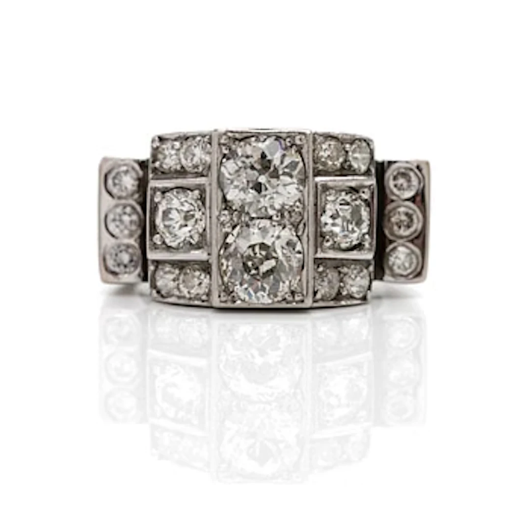 18K white gold ring with diamonds.