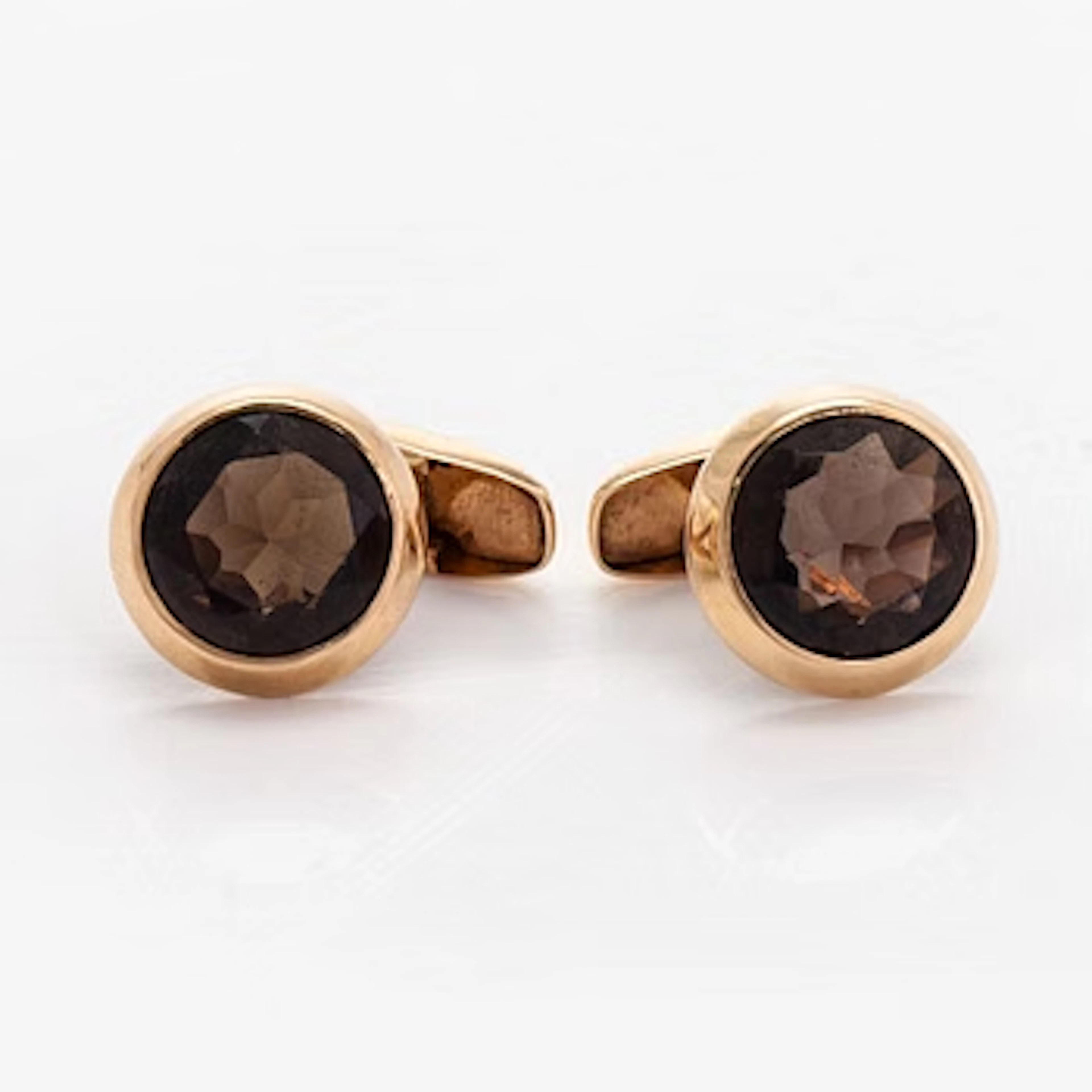 Cufflinks, faceted smoky quartz, 14K gold. Martti Viikinniemi, 1970.