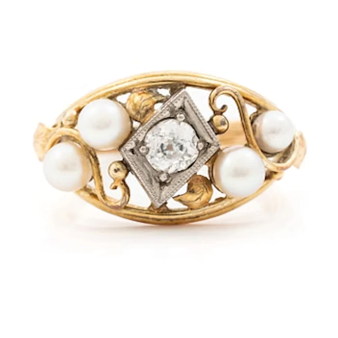 14K gold ring with an old-cut diamond and pearls.