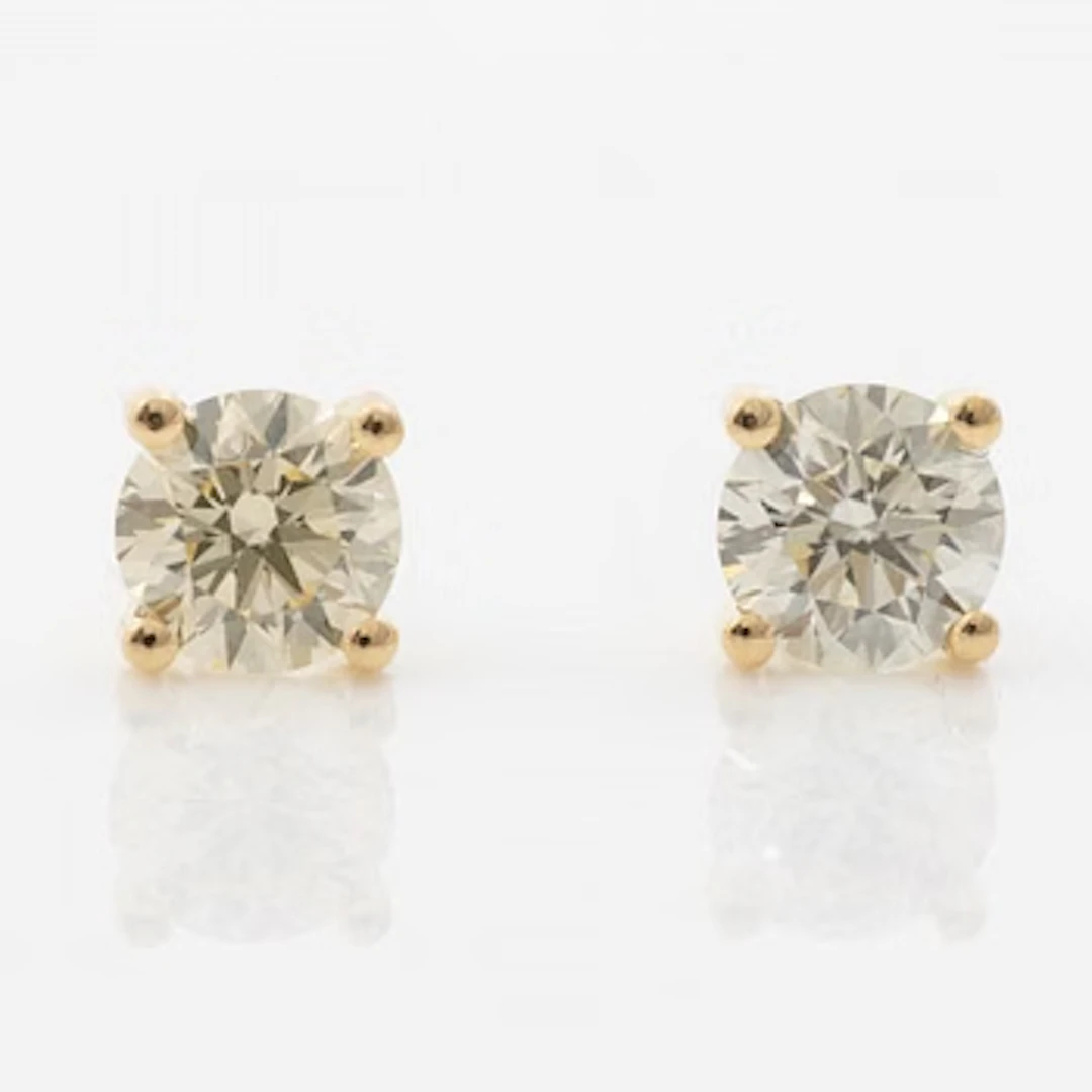 Earrings 18K gold with brilliant-cut diamonds.