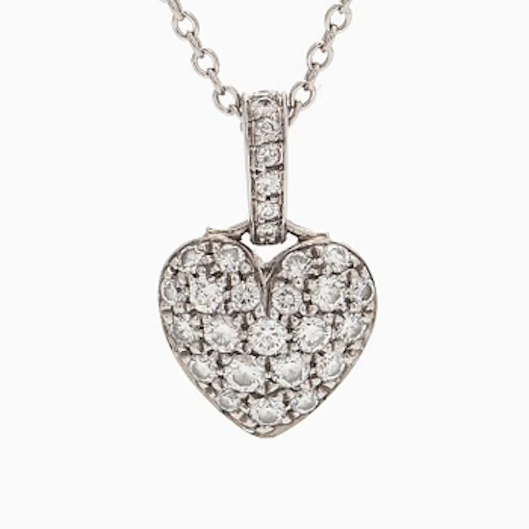 Tiffany & Co, a platinum heart pendant necklace with brilliant-cut diamonds.