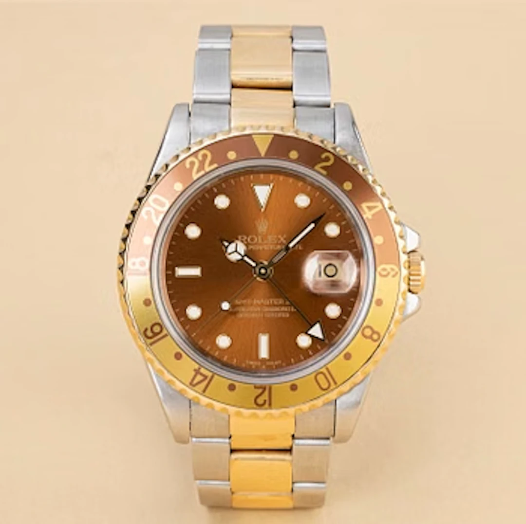 Rolex, GMT-Master II, "Root Beer" & "Black Tritium Dial & Insert", ca 1995.
