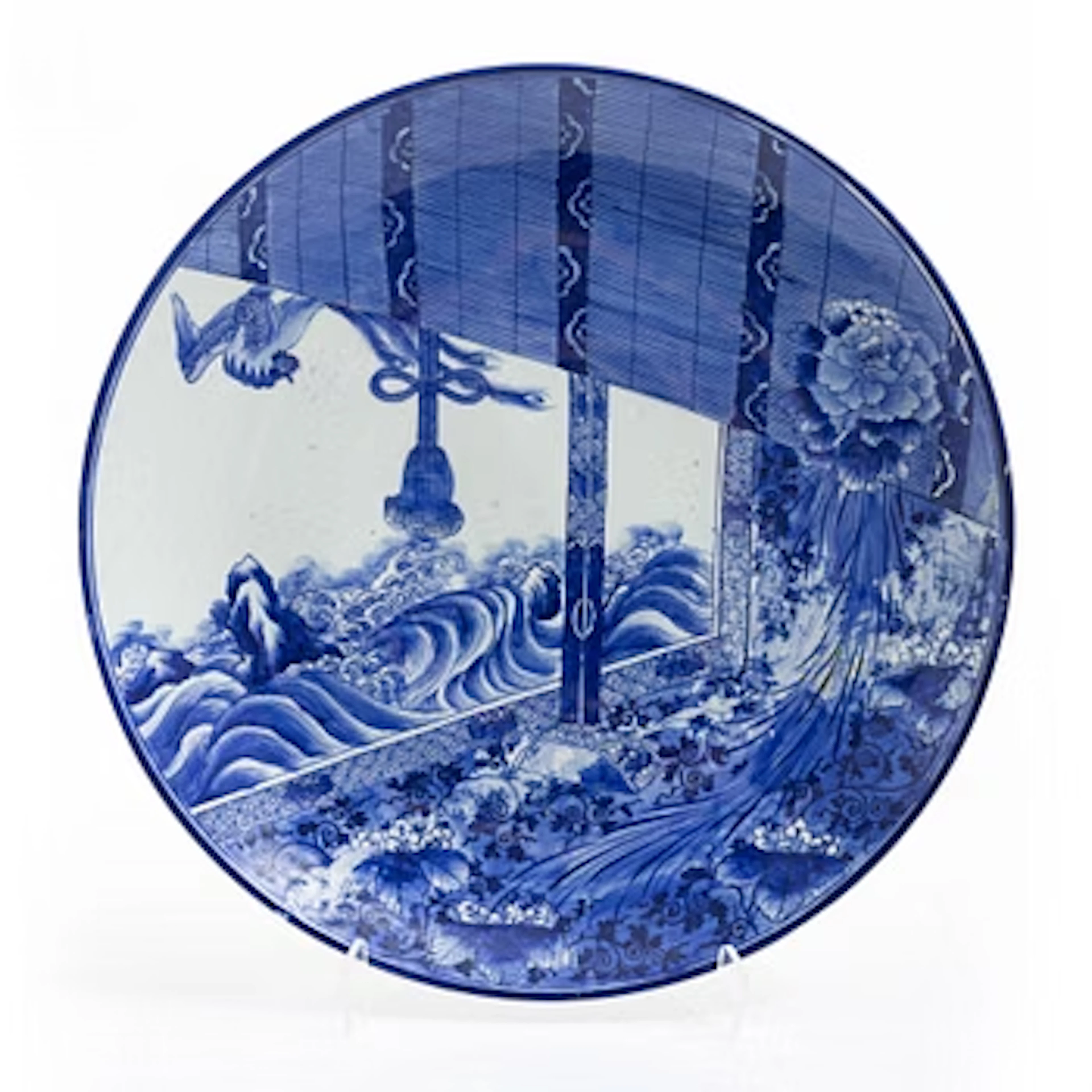 A large Japanese blue and white charger, early 20th century.