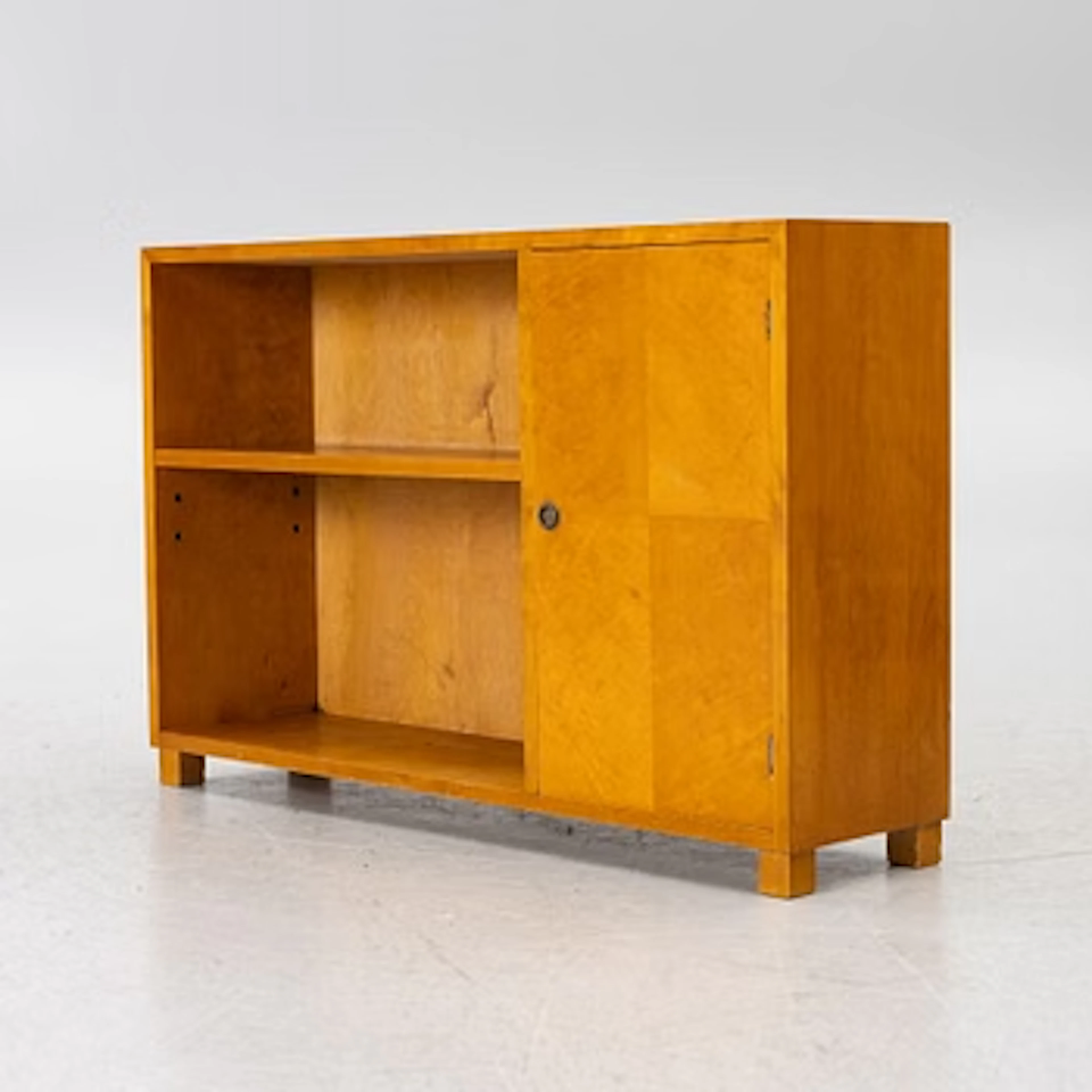 A bookcase with cabinet, 1930s.