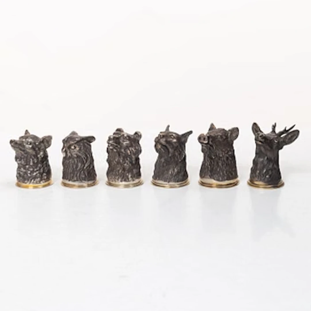 Six Russian parcel-gilt silver animal's head stirrup cups, including