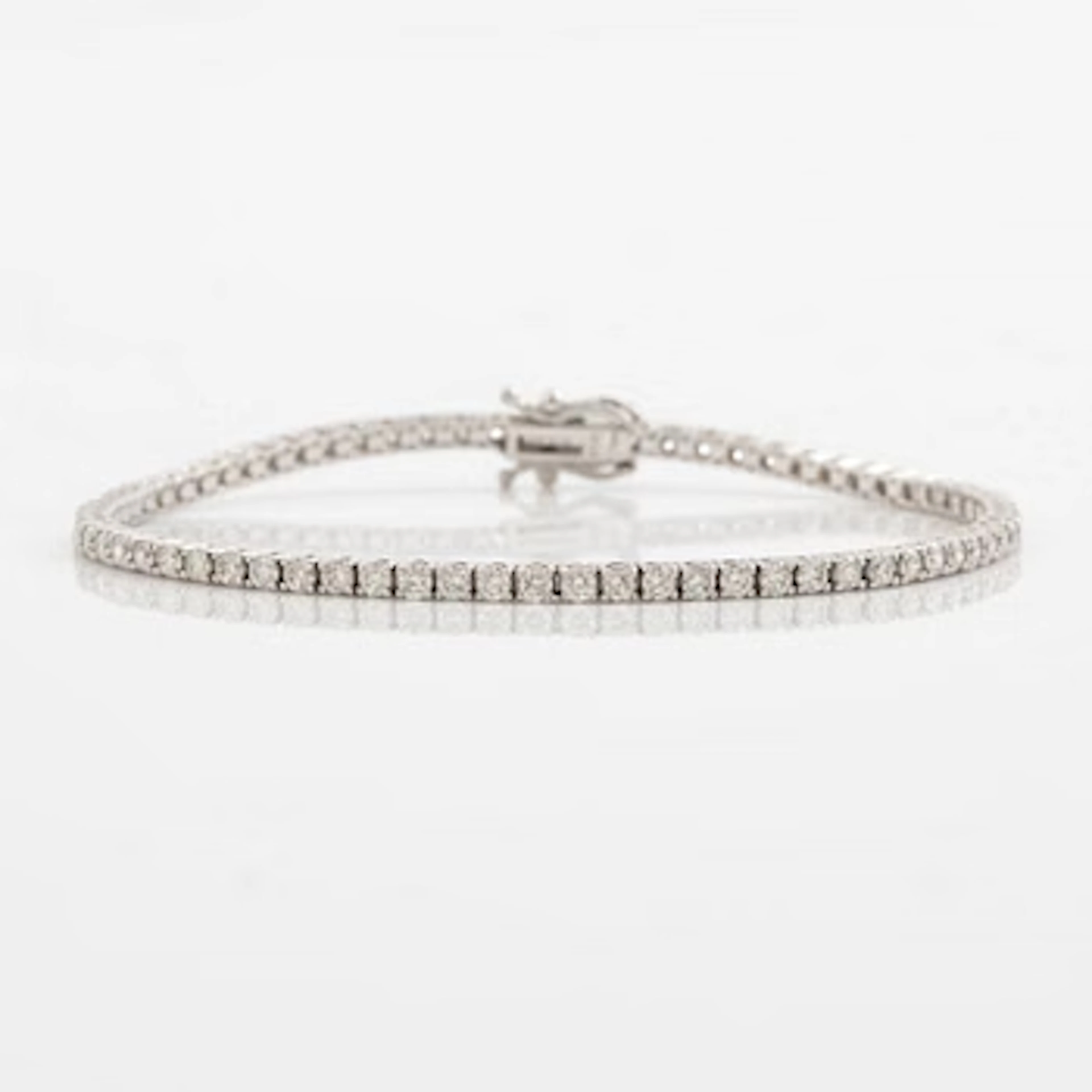 Tennis bracelet 18K white gold with brilliant-cut diamonds.
