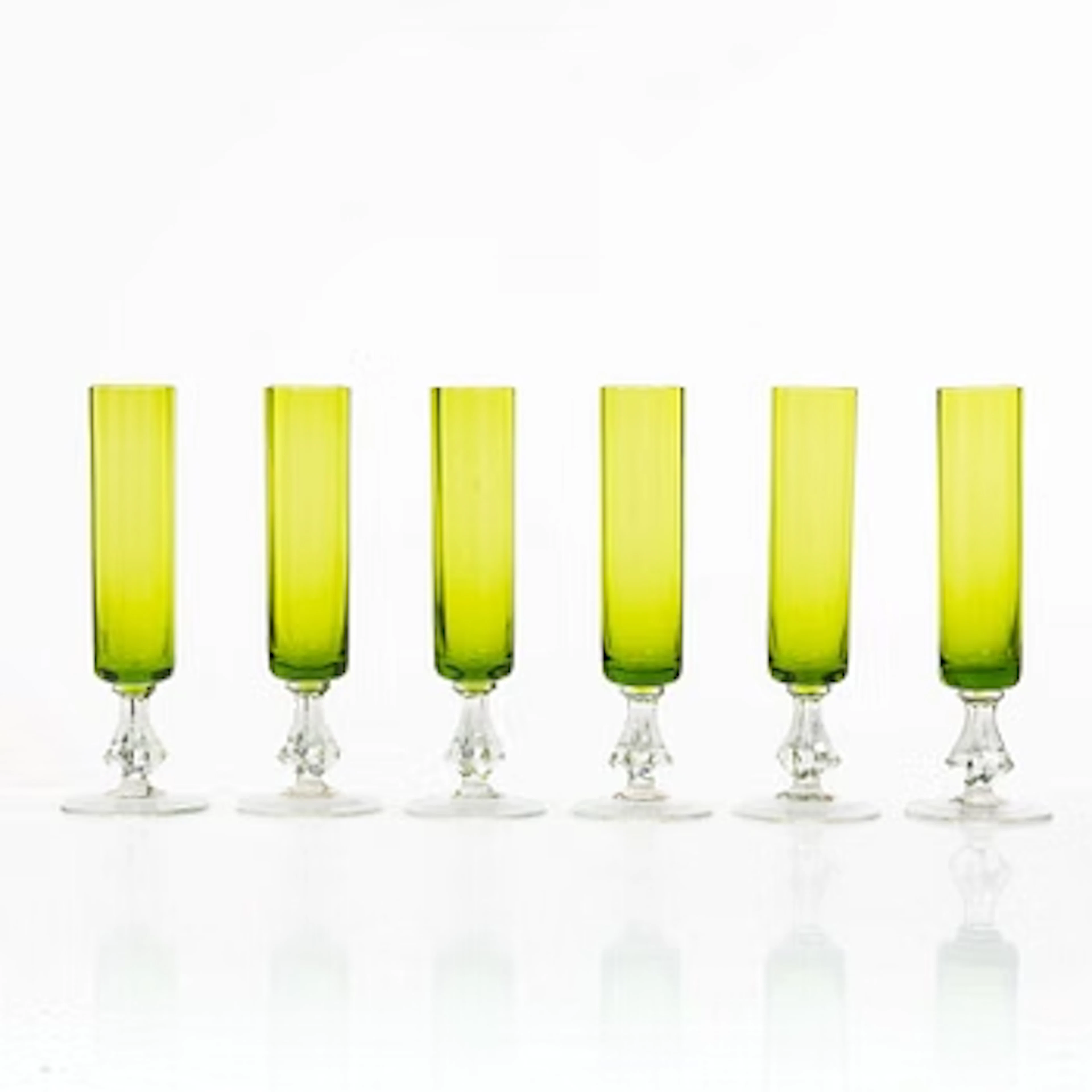 A set of six champagne flutes.