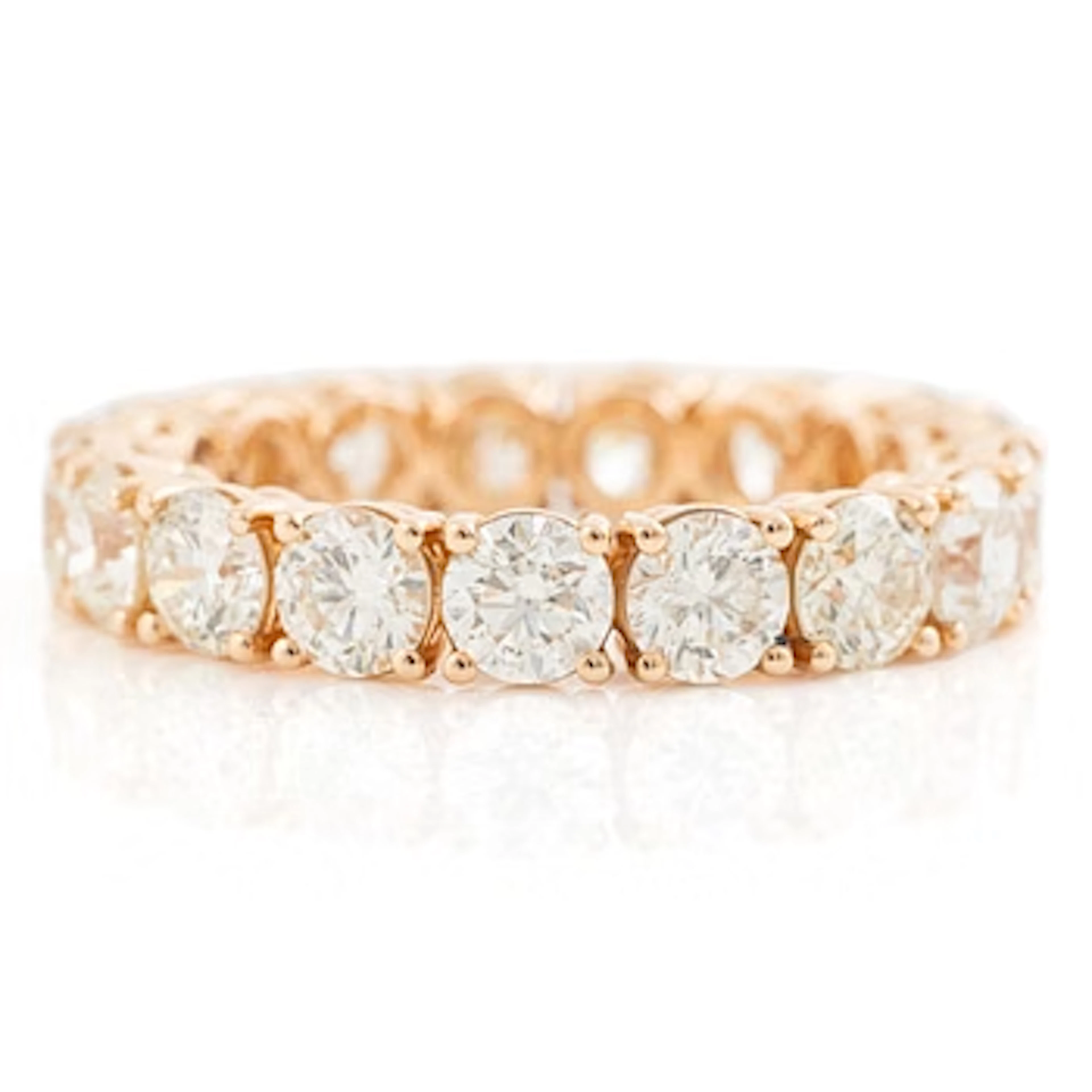 Full eternity ring in 18K rose gold set with brilliant-cut diamonds.