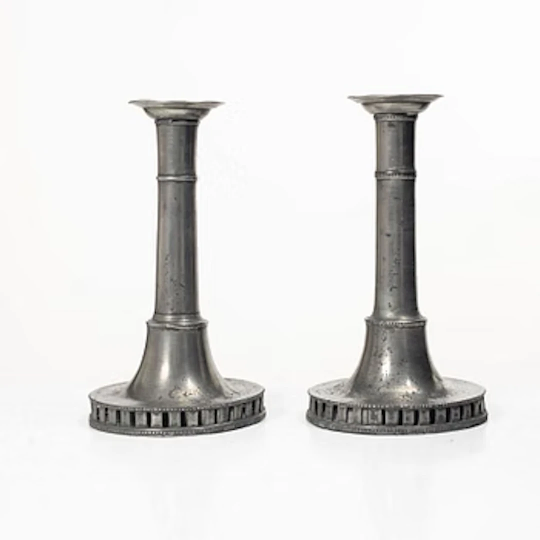 A pair of late gustavian pewter candlesticks attr. to Hans Wicksten