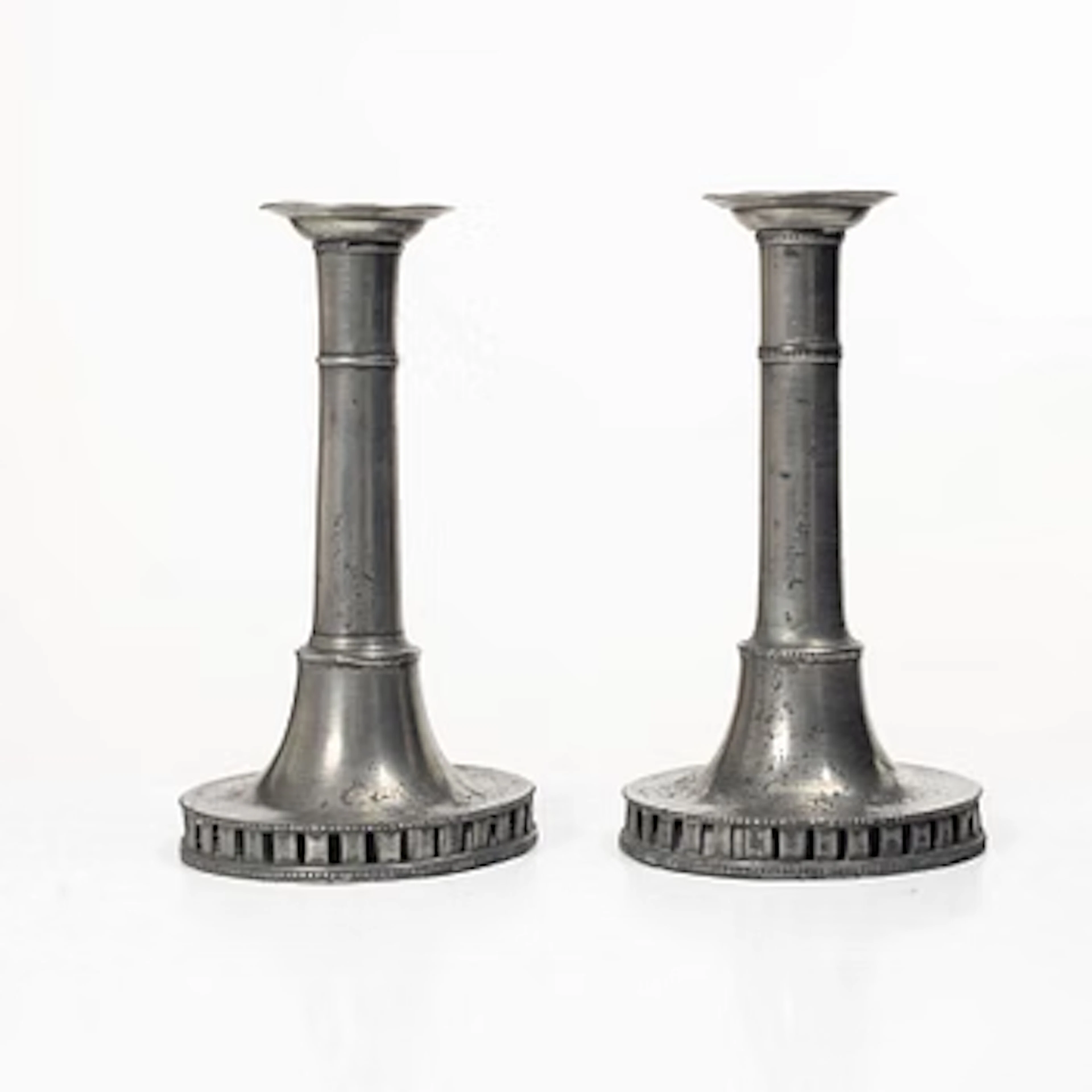A pair of late gustavian pewter candlesticks attr. to Hans Wicksten